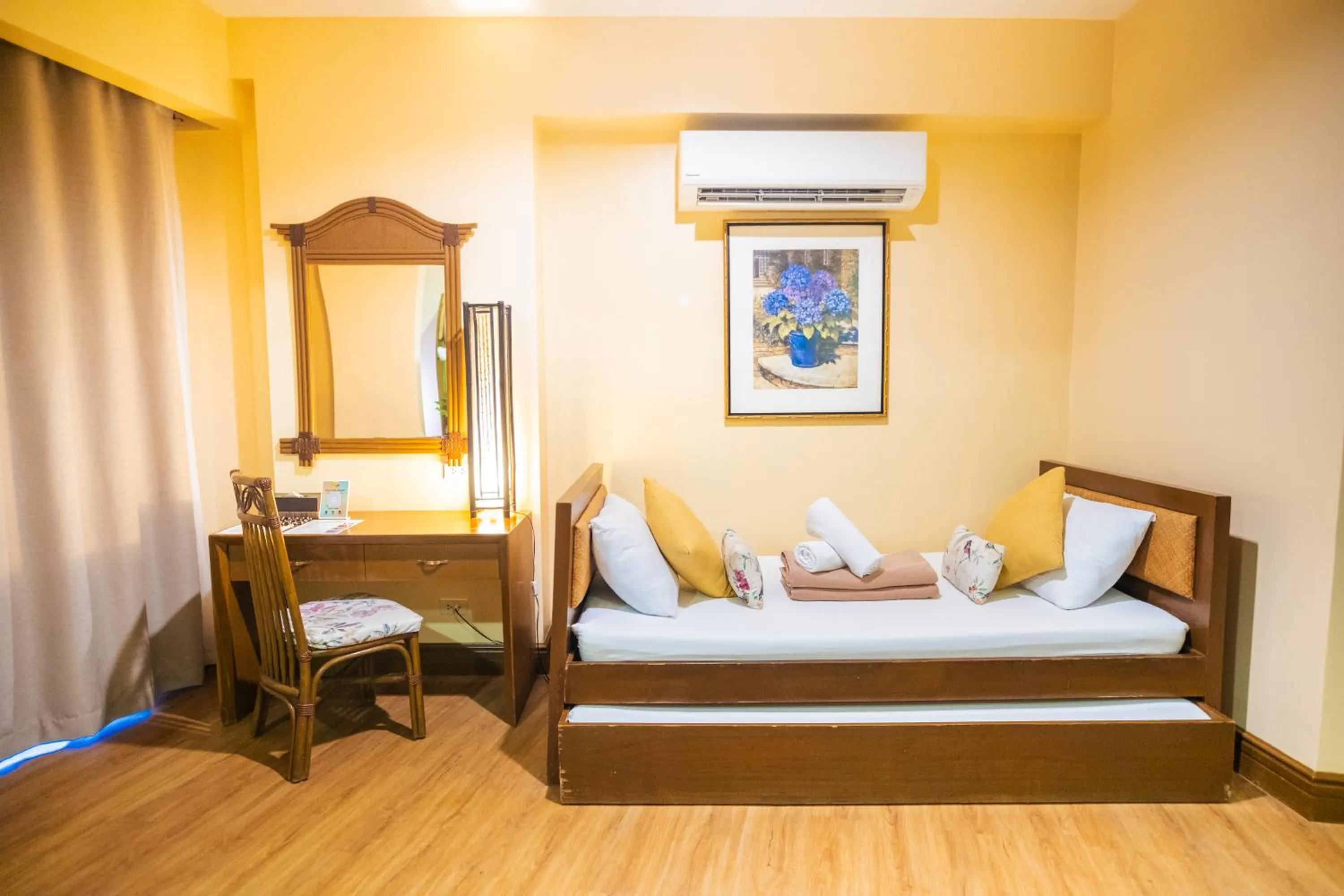 Bed in Boracay Tropics Resort Hotel