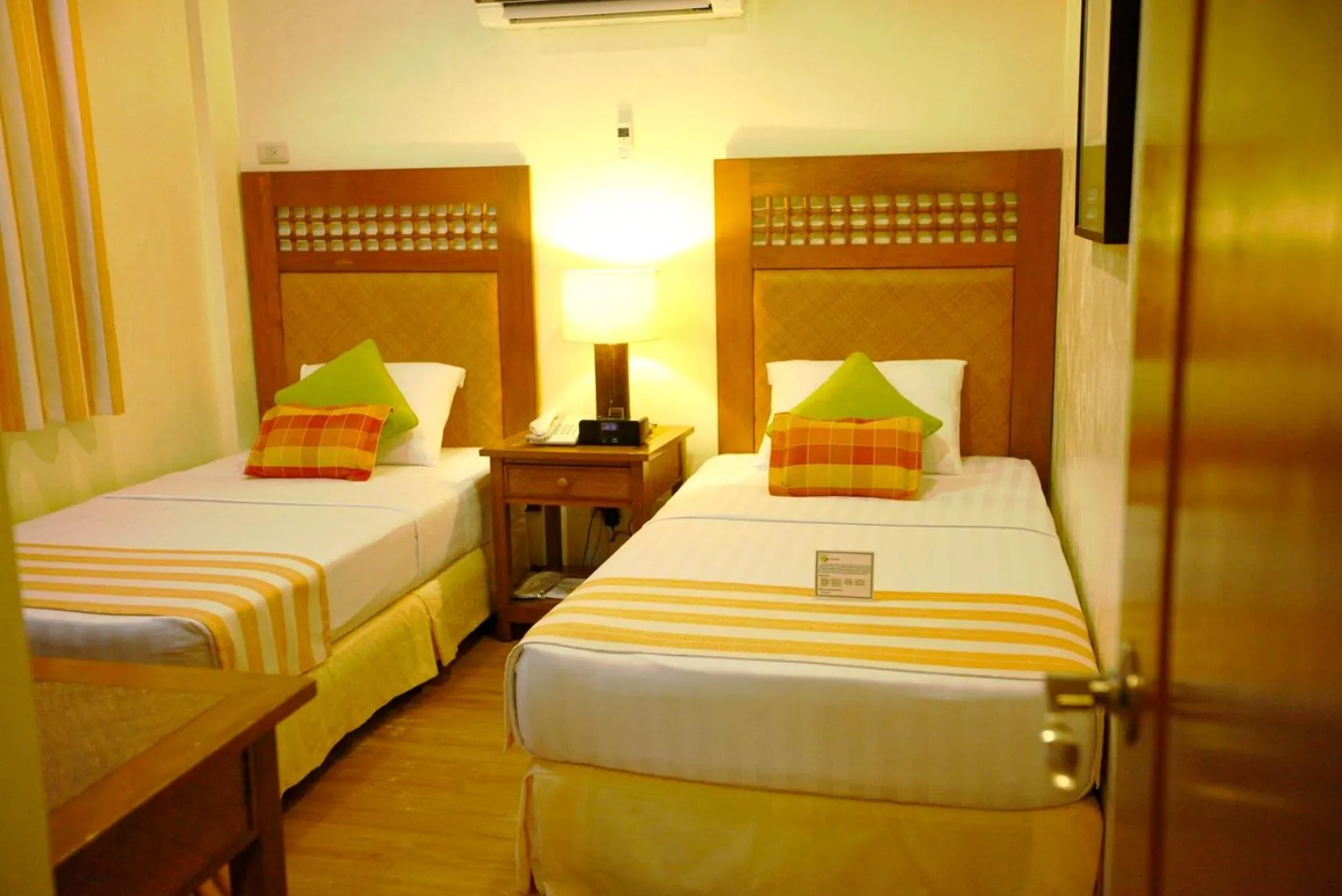 Bed in Boracay Tropics Resort Hotel