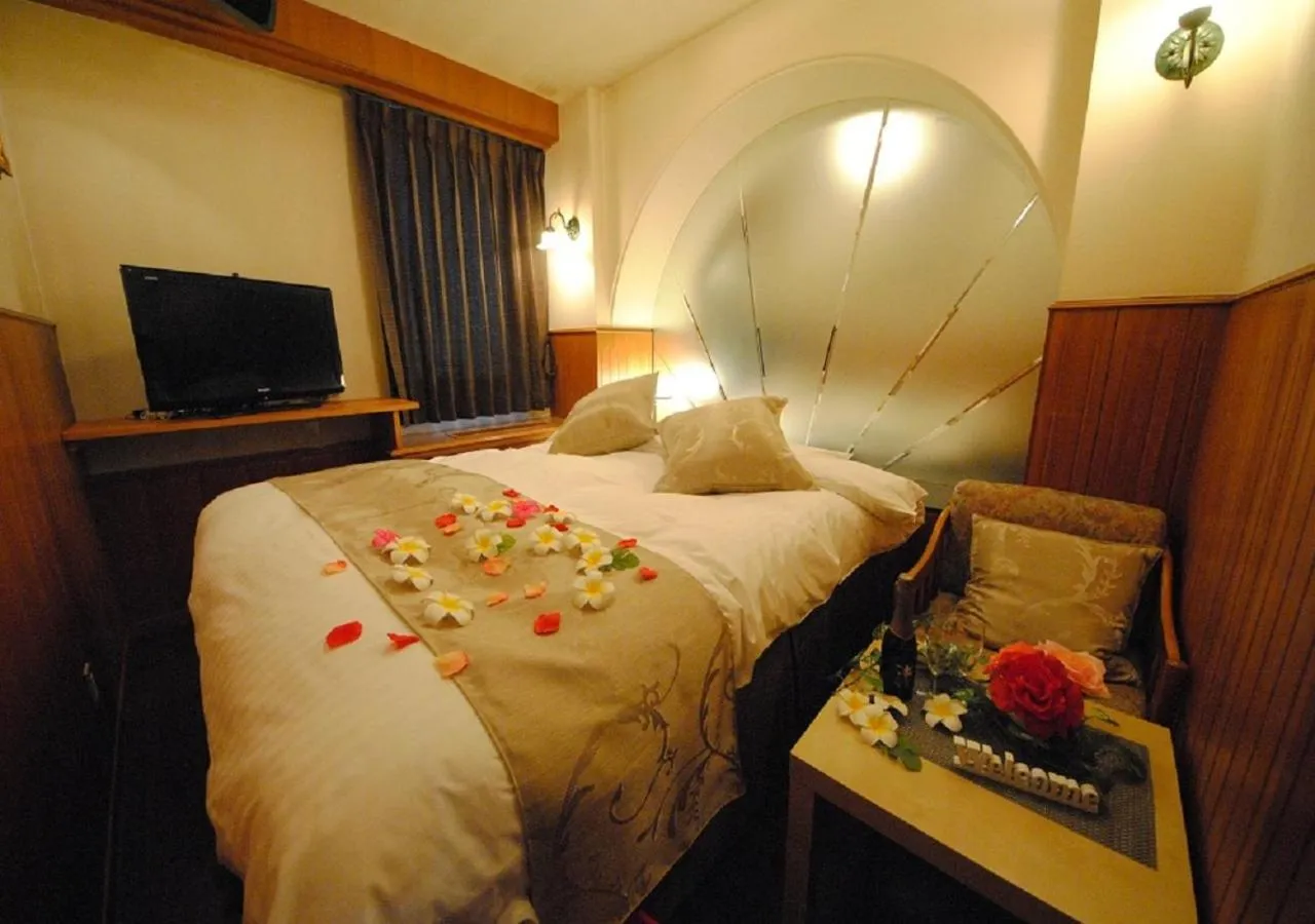 Bed in ホテル マリオン 鈴鹿