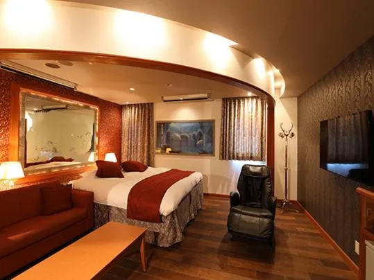 Bed in ホテル マリオン 鈴鹿