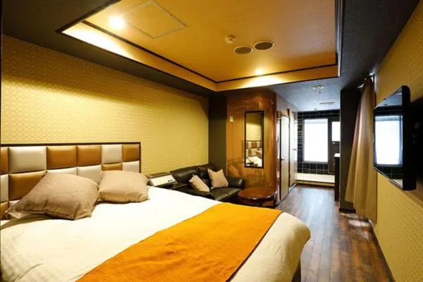 Bed in ホテル マリオン 鈴鹿