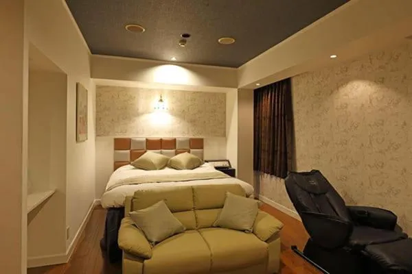 Bed in ホテル マリオン 鈴鹿