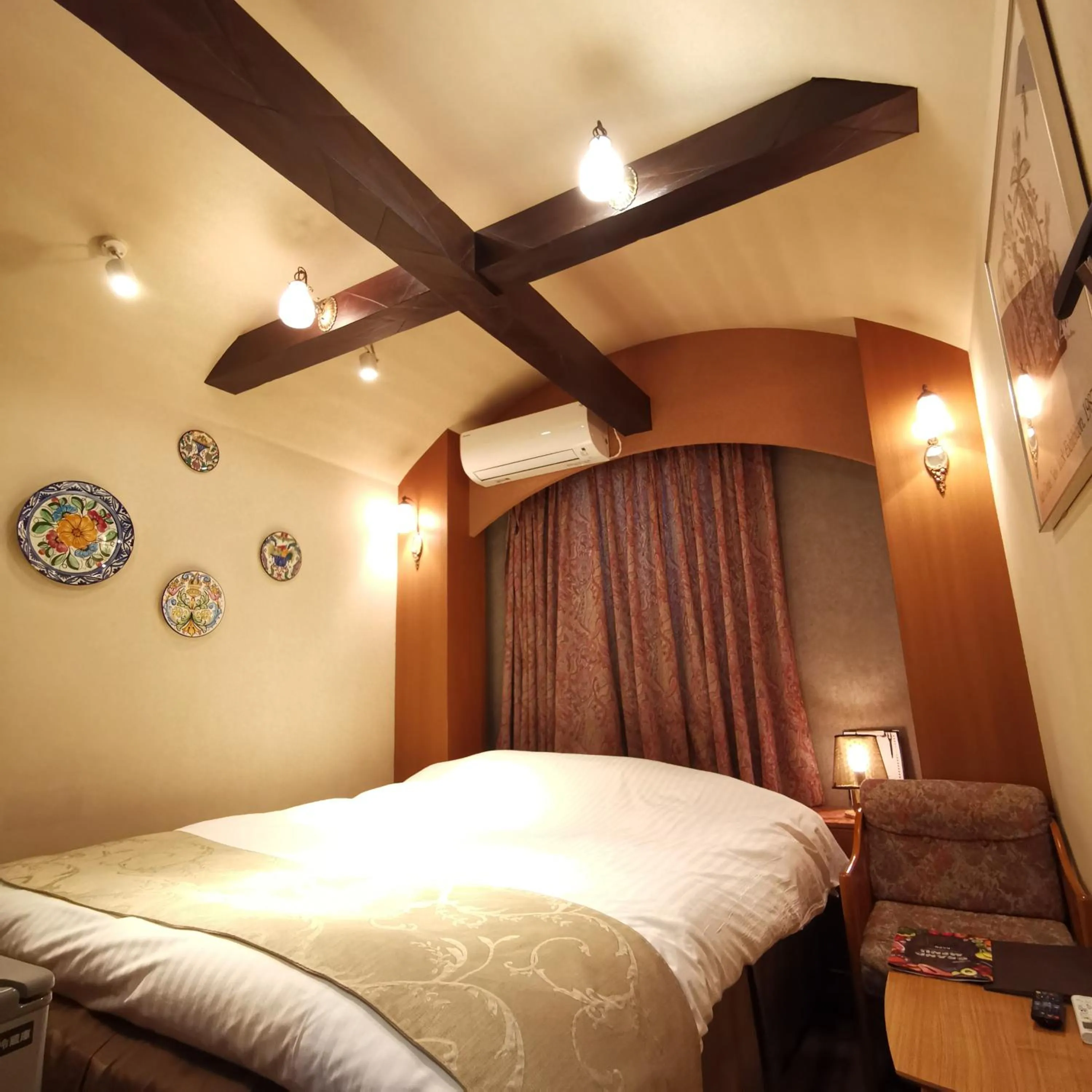 Bed in ホテル マリオン 鈴鹿