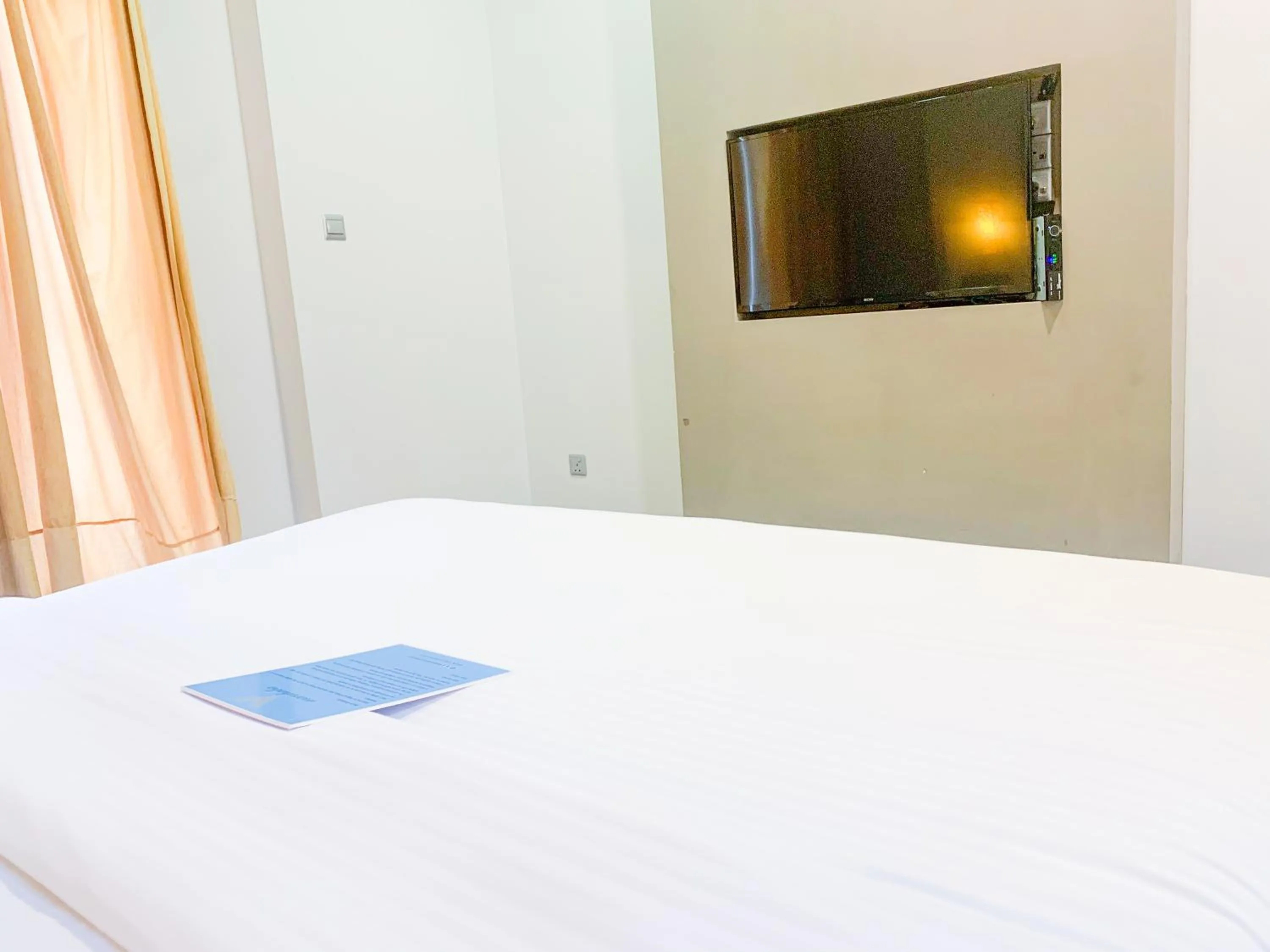 TV and multimedia, Bed in Velana Beach Hotel Maldives