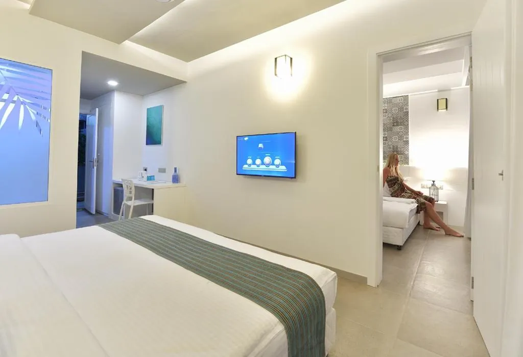 Bedroom, Bed in Velana Beach Hotel Maldives