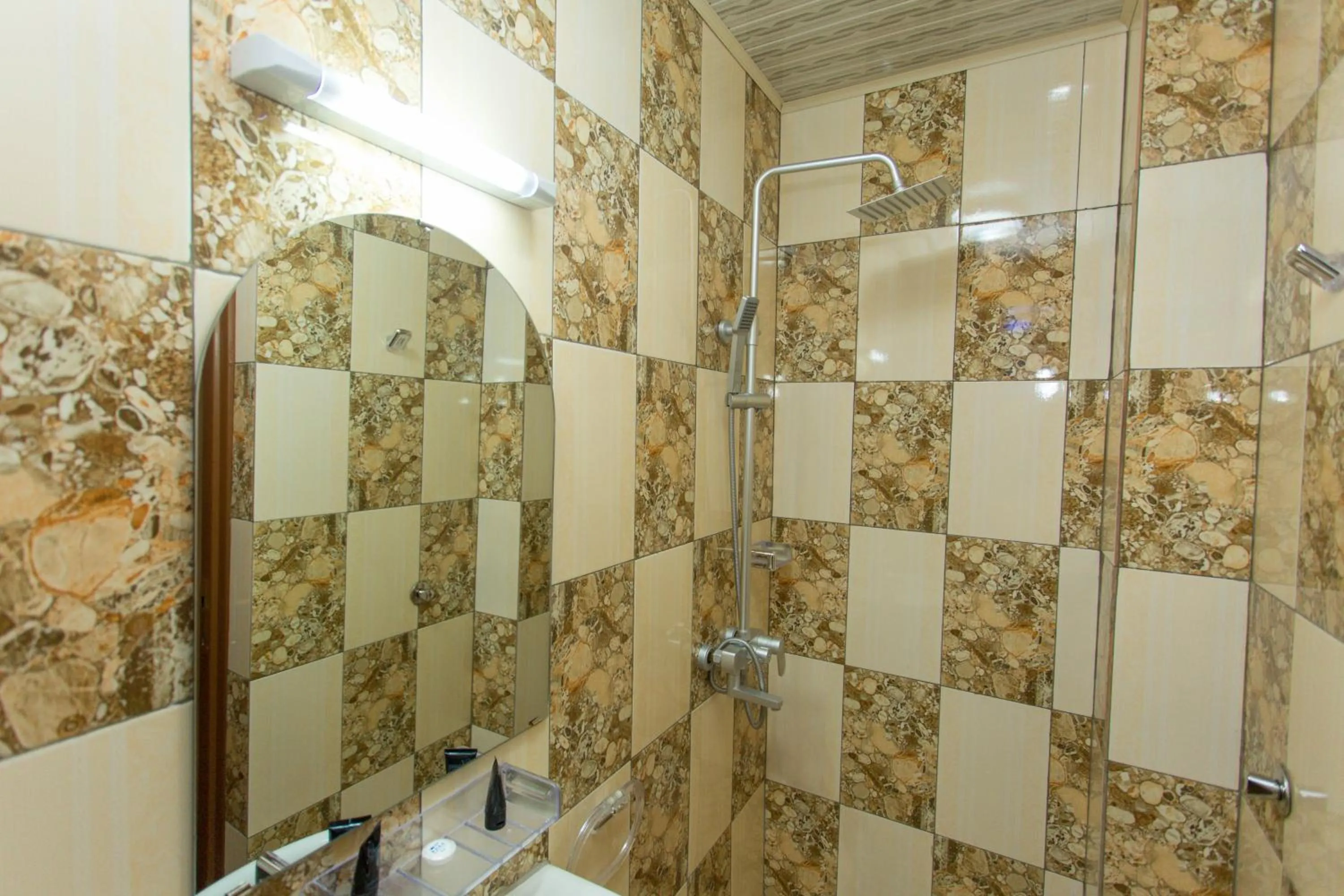 Shower in Anthurium Residential Hotel