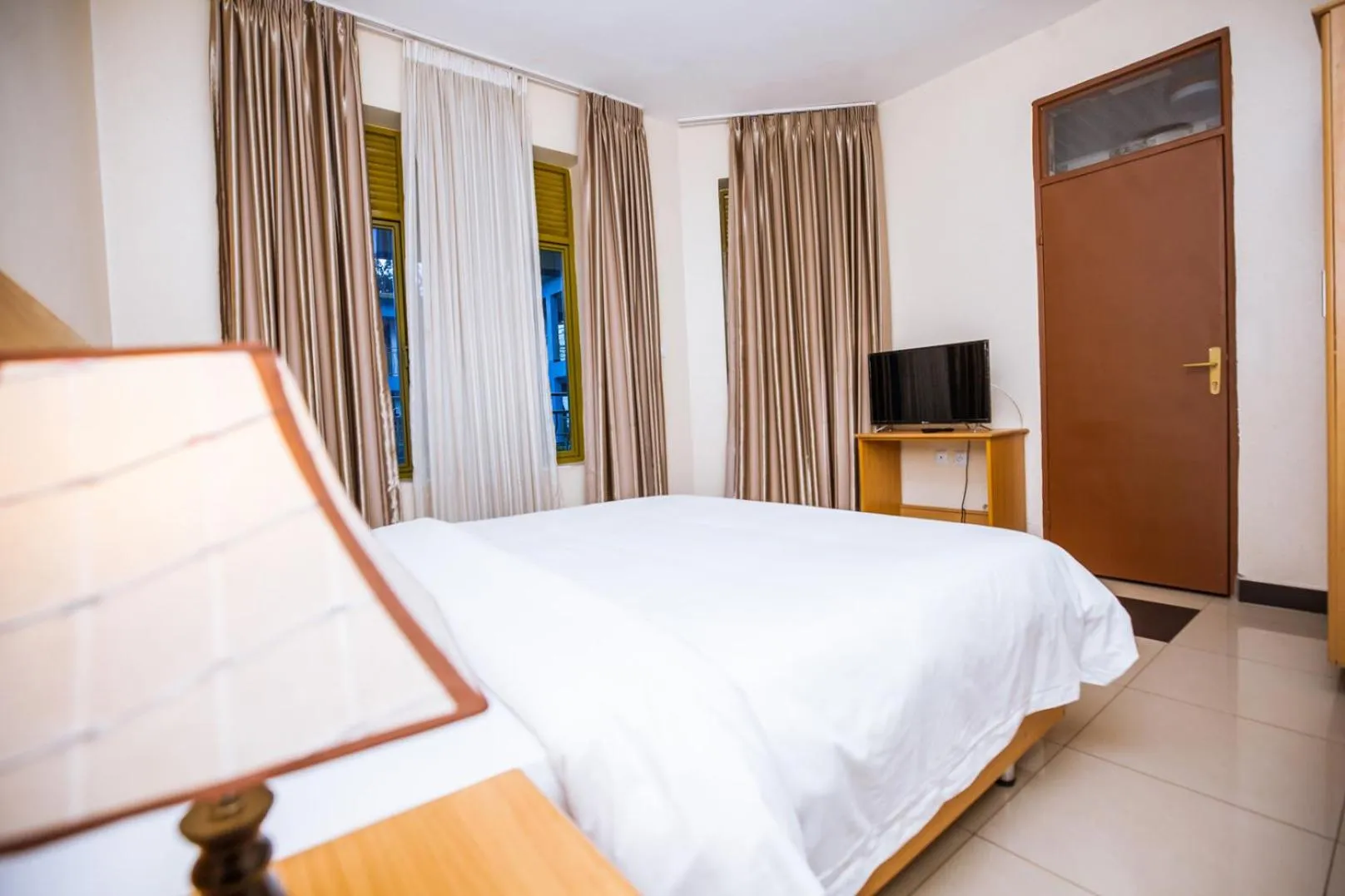 Bed in Anthurium Residential Hotel