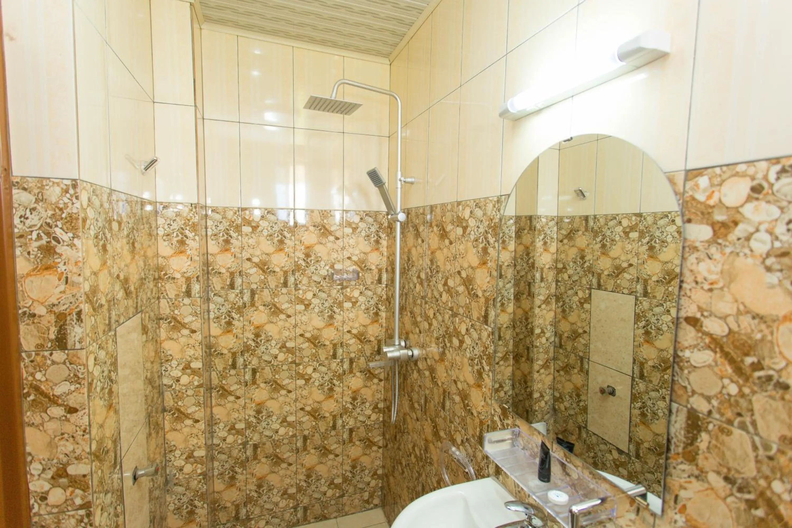 Shower in Anthurium Residential Hotel