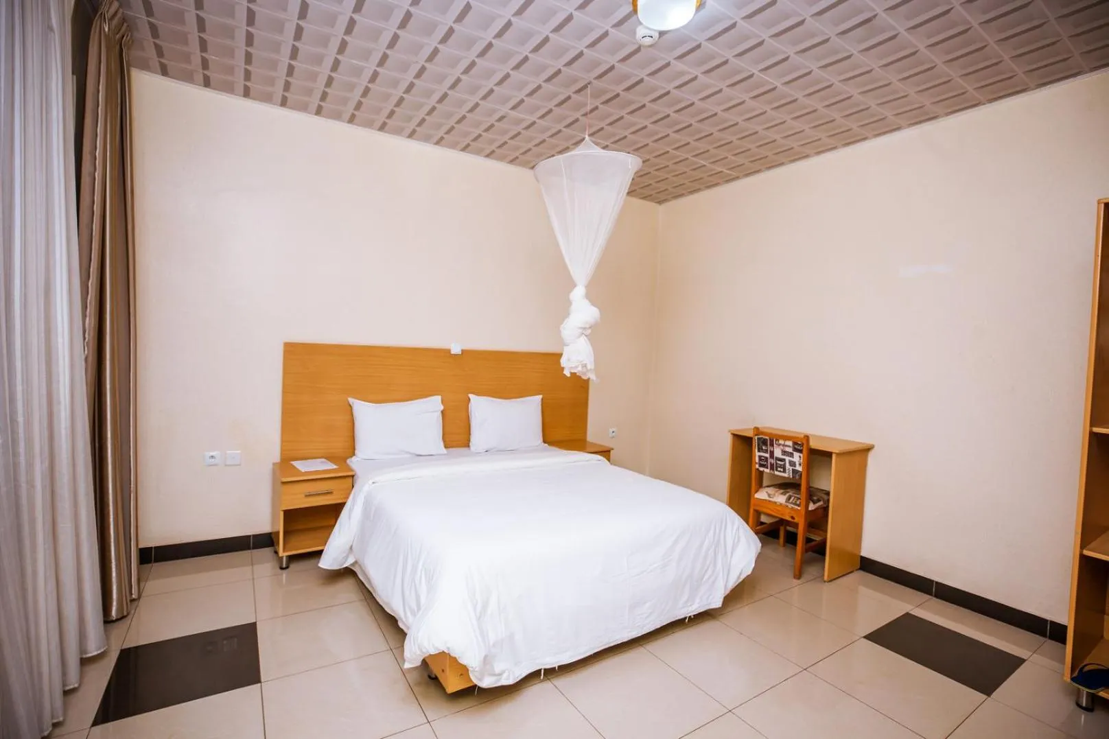 Bed in Anthurium Residential Hotel