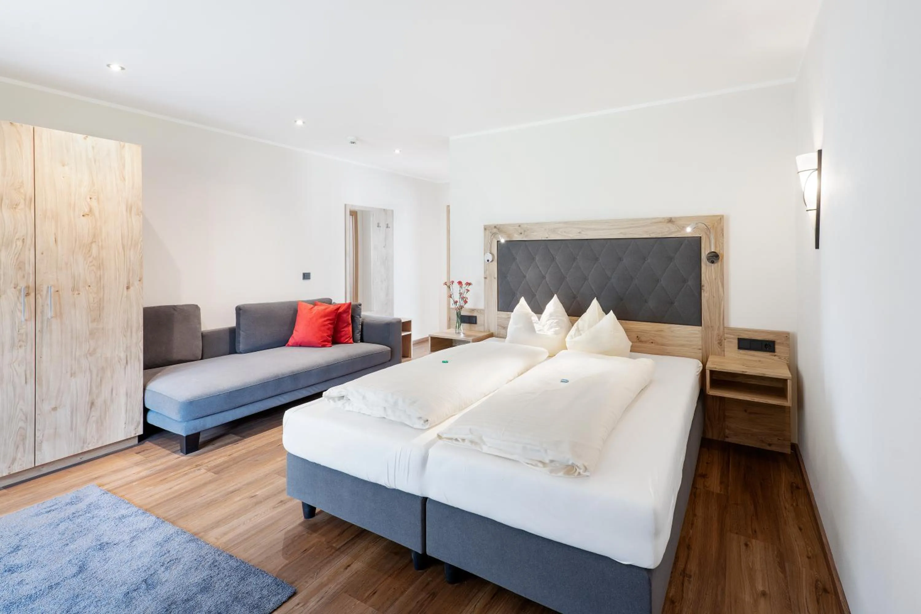 Photo of the whole room, Bed in Golf- und Sporthotel Moarhof