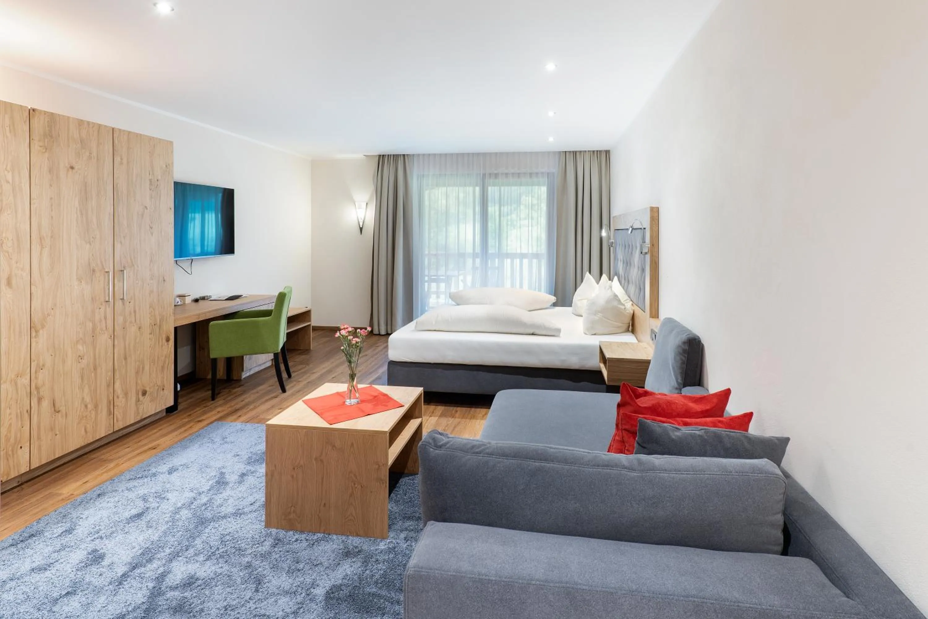 Photo of the whole room, Bed in Golf- und Sporthotel Moarhof