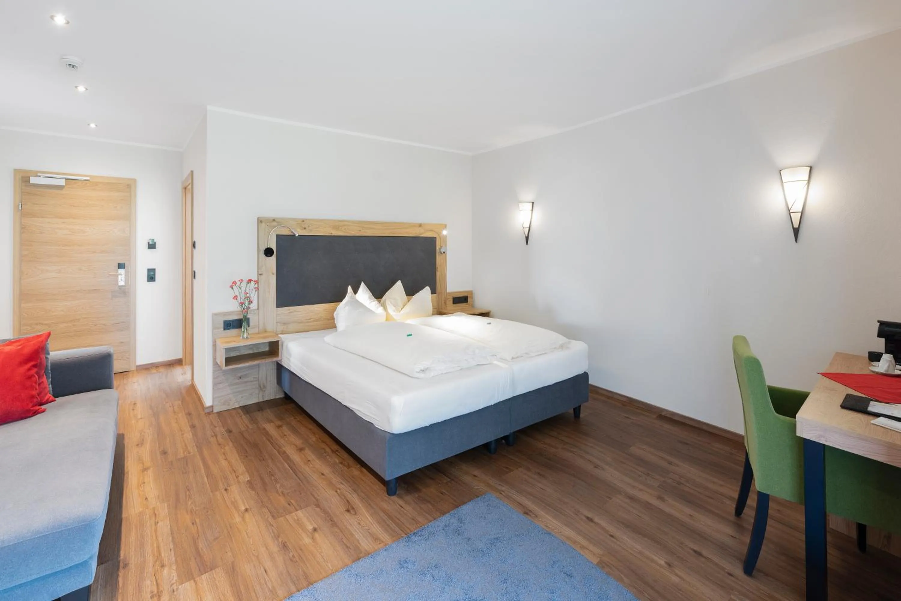 Photo of the whole room, Bed in Golf- und Sporthotel Moarhof