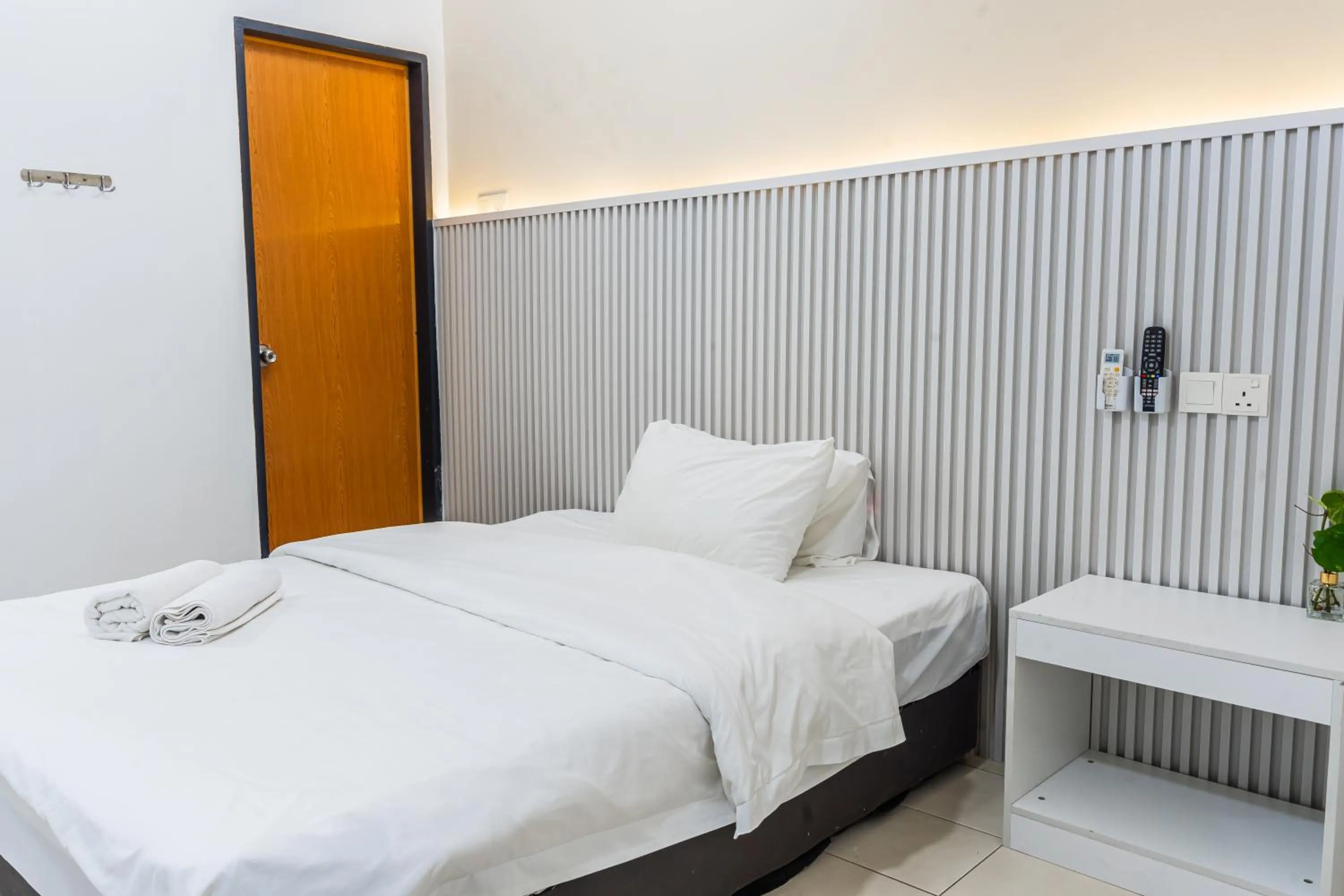 Bed in Ihome Boutique Hotel