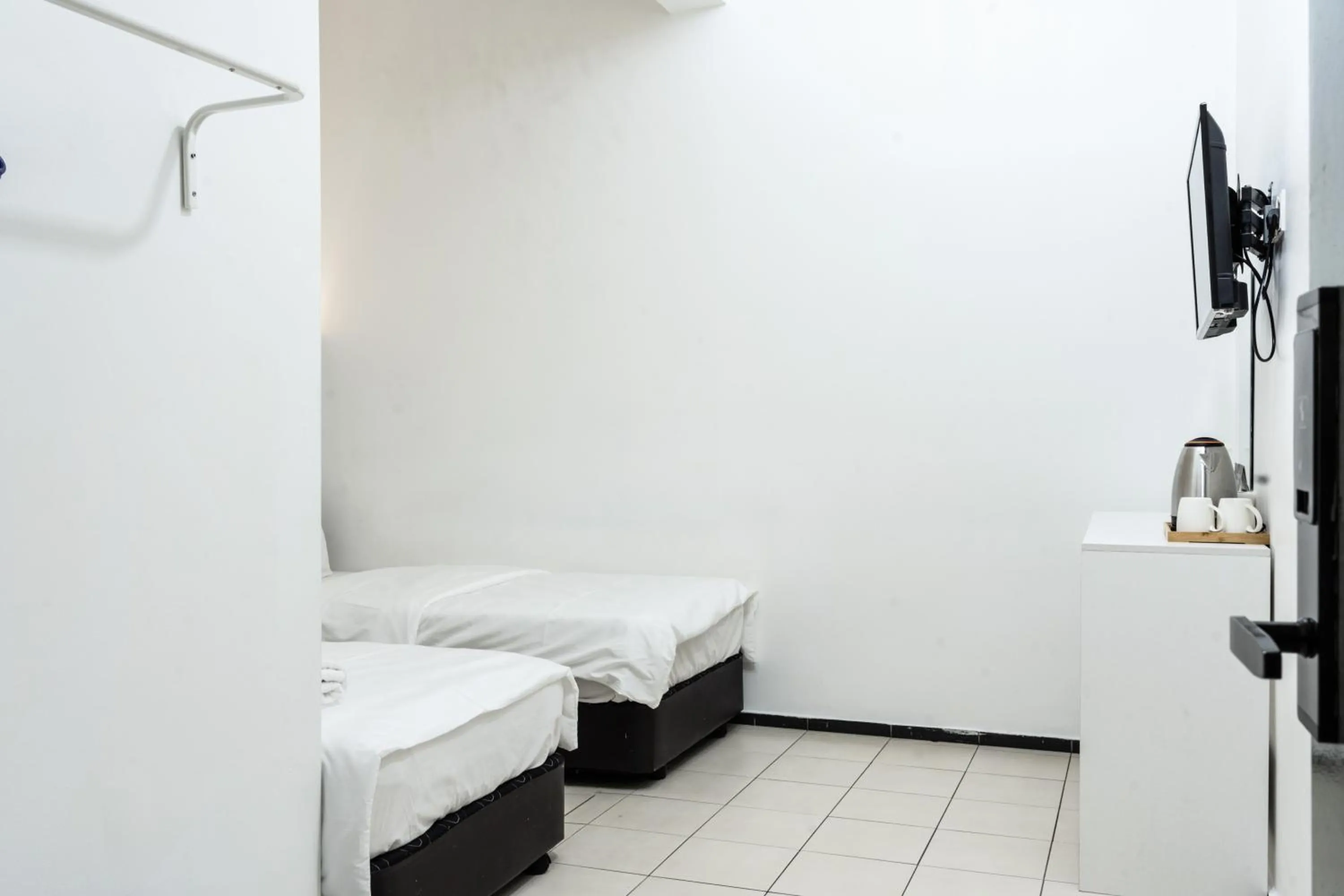 Bed in Ihome Boutique Hotel