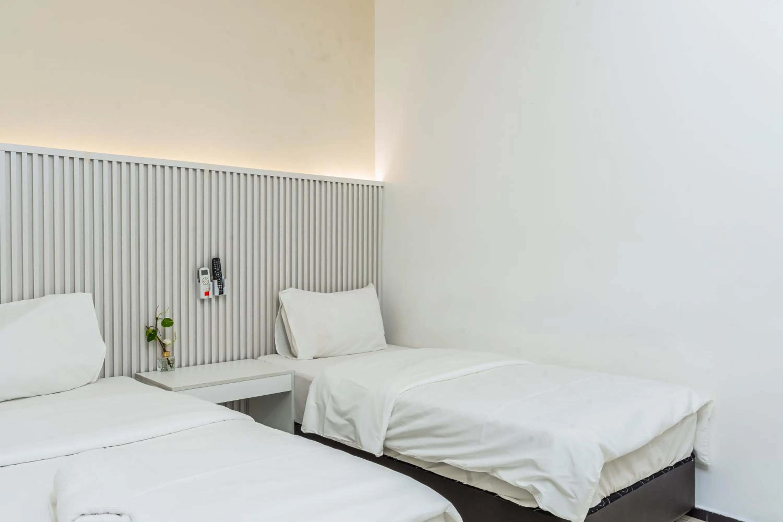 Bed in Ihome Boutique Hotel