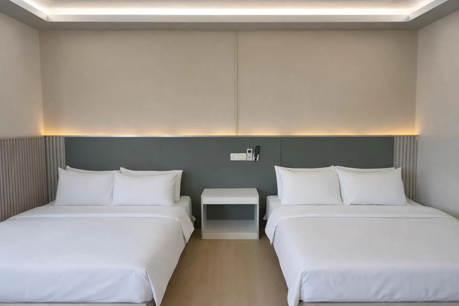 Bed in Ihome Boutique Hotel
