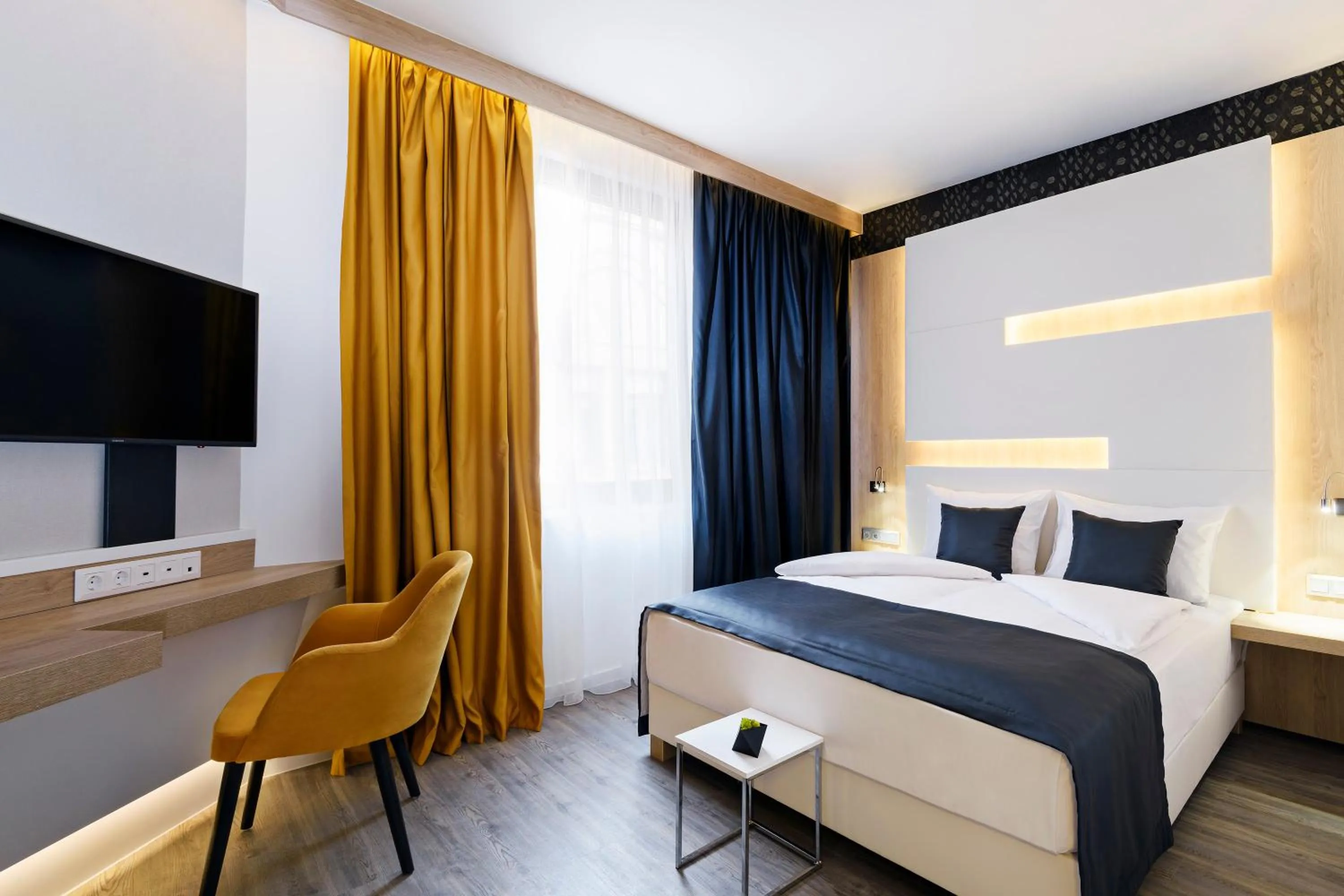 Bed in KViHotel Budapest - the smart hotel