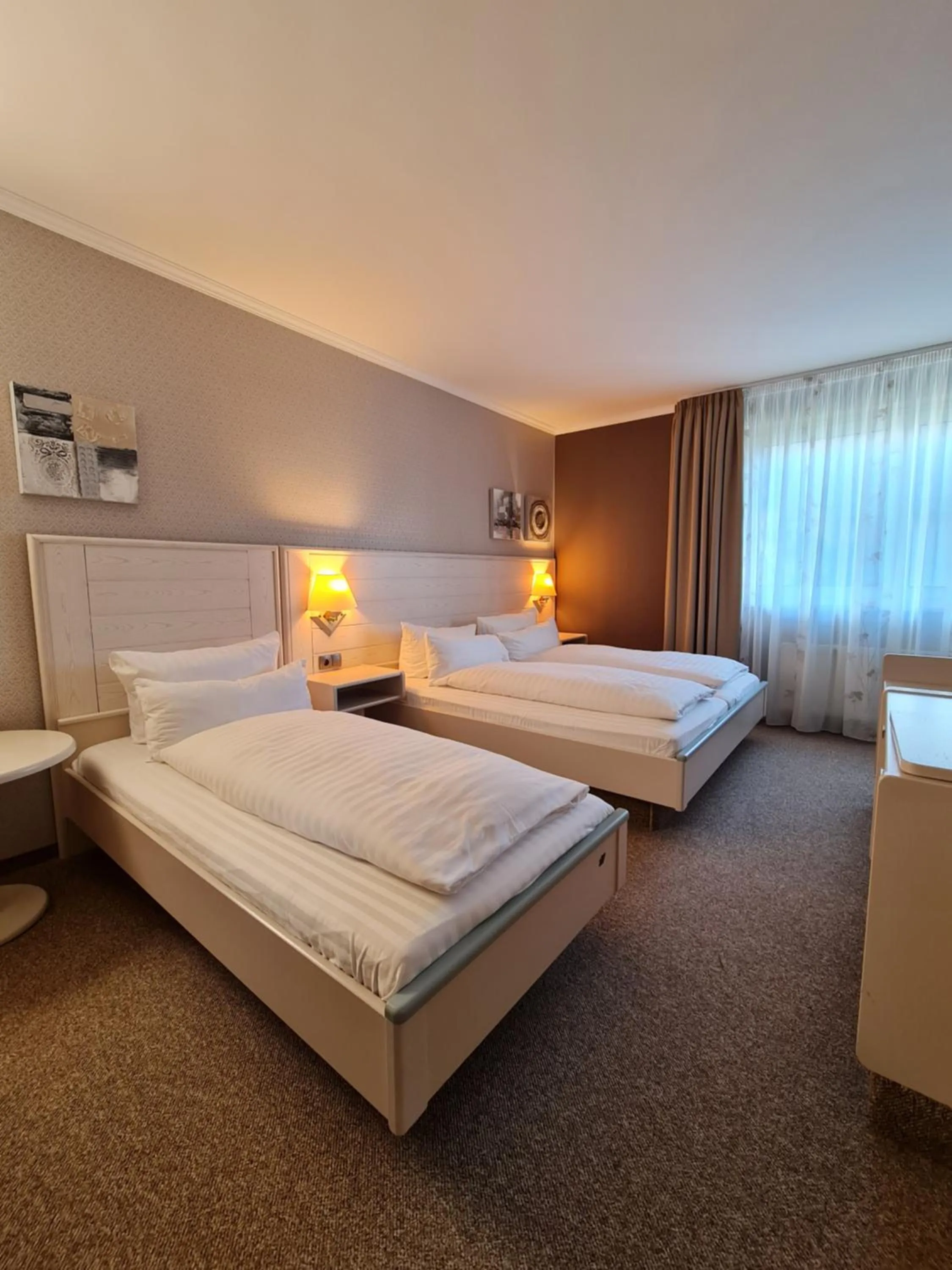 Bed in Ambiente Hotel garni