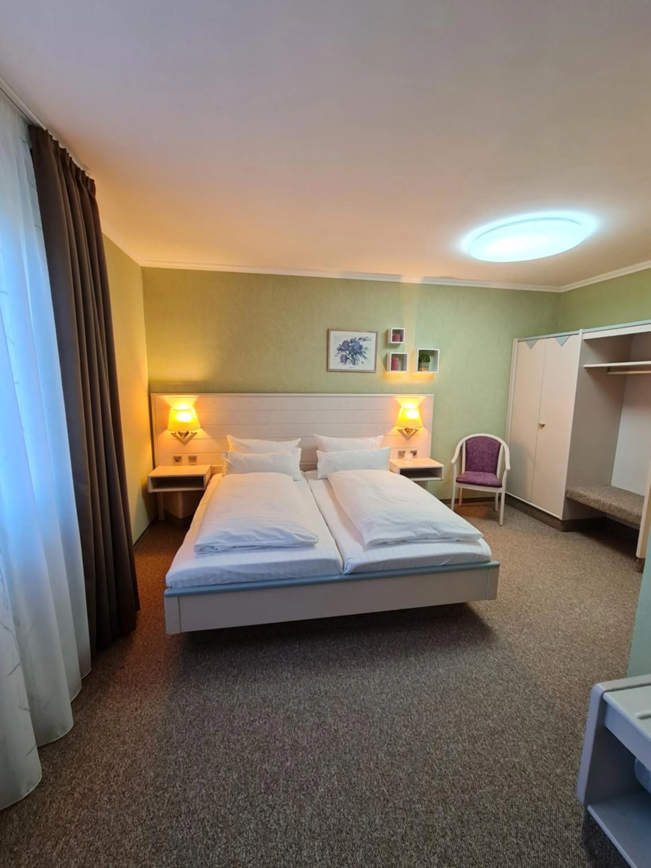 Bed in Ambiente Hotel garni