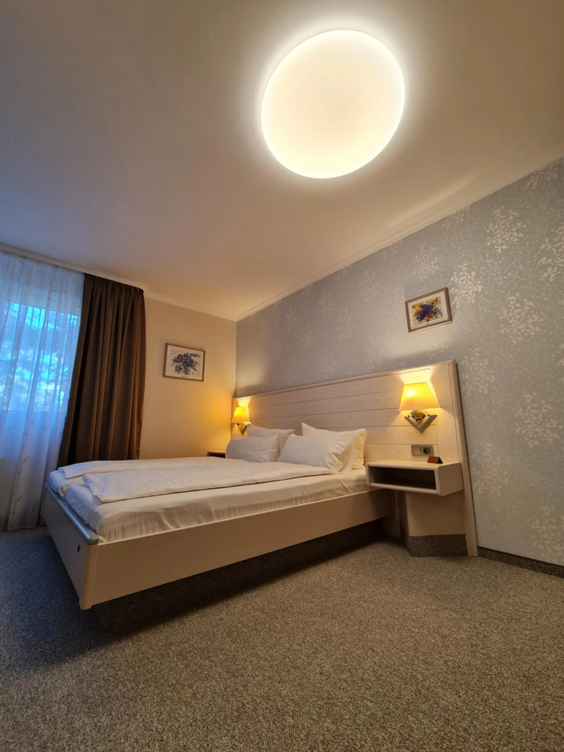 Bed in Ambiente Hotel garni