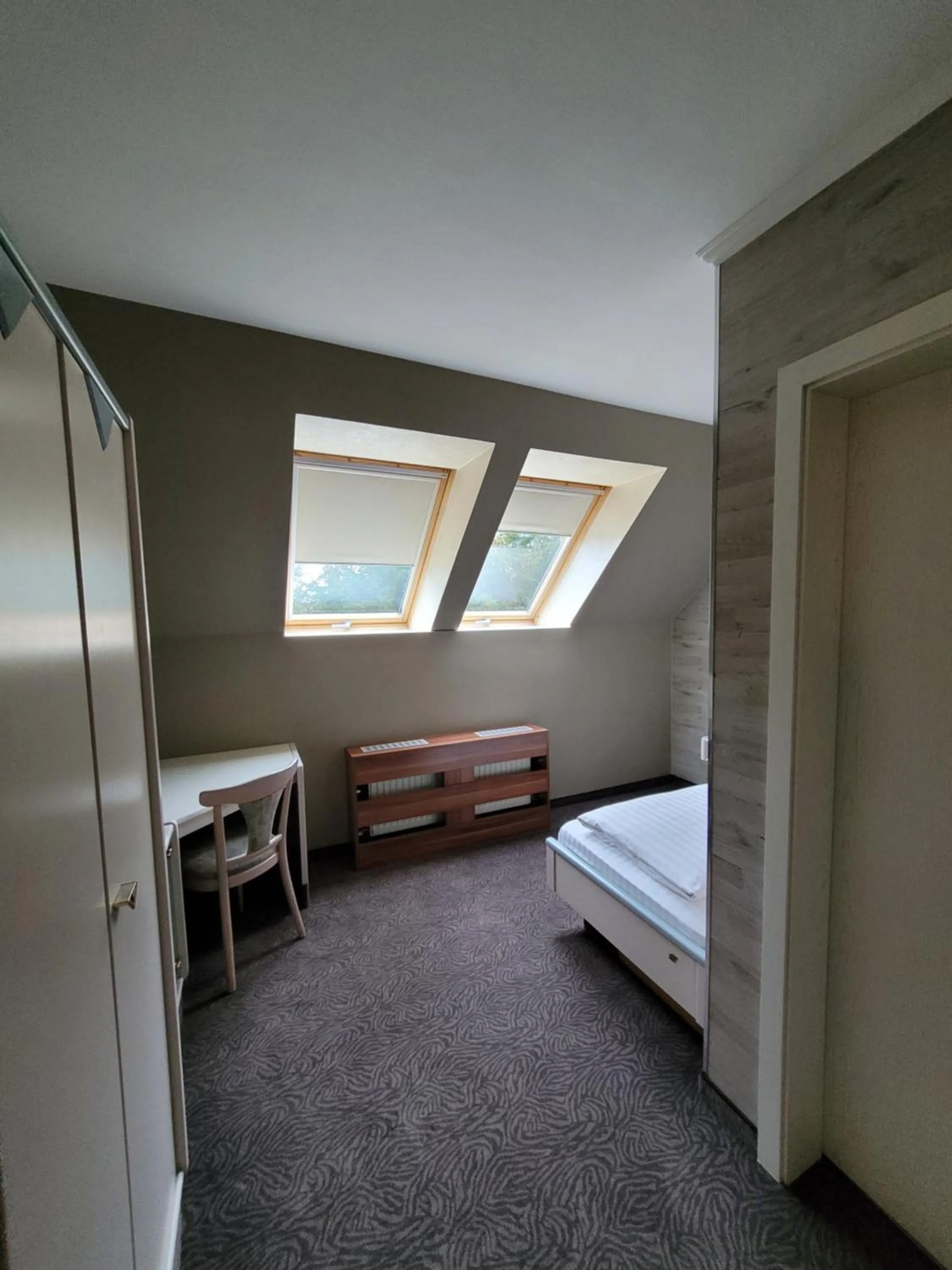 Bed in Ambiente Hotel garni