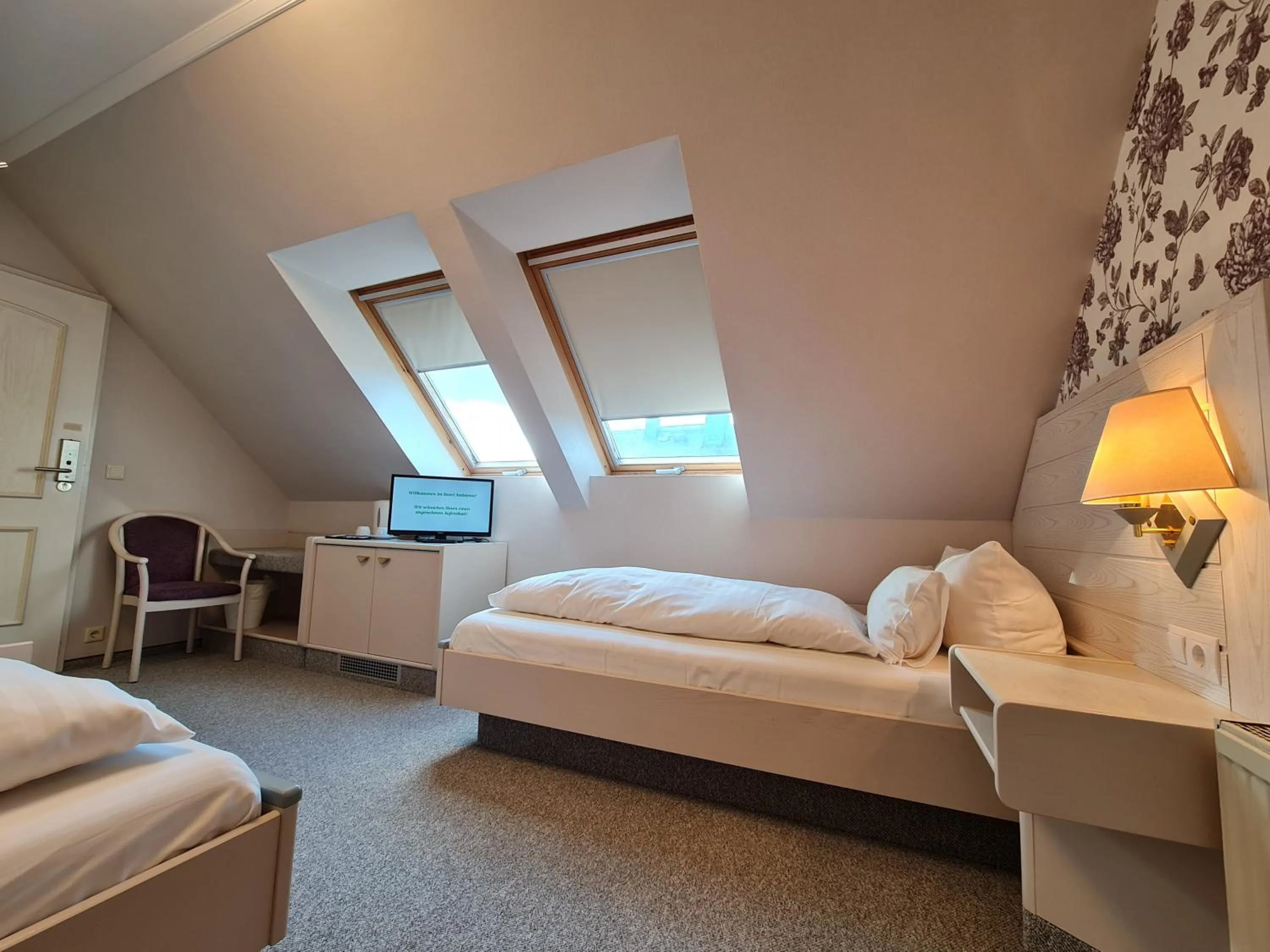 Bed in Ambiente Hotel garni