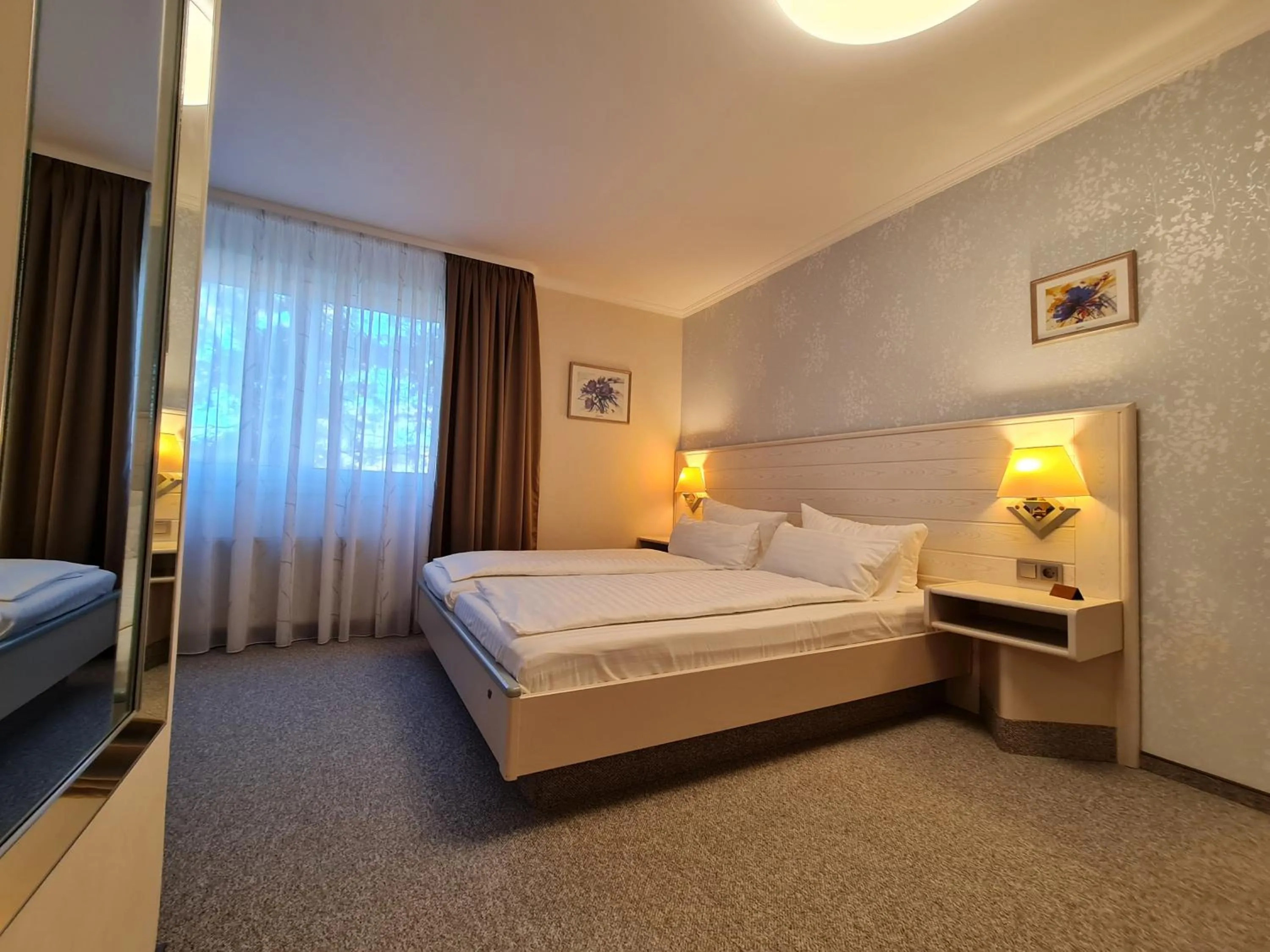 Bed in Ambiente Hotel garni