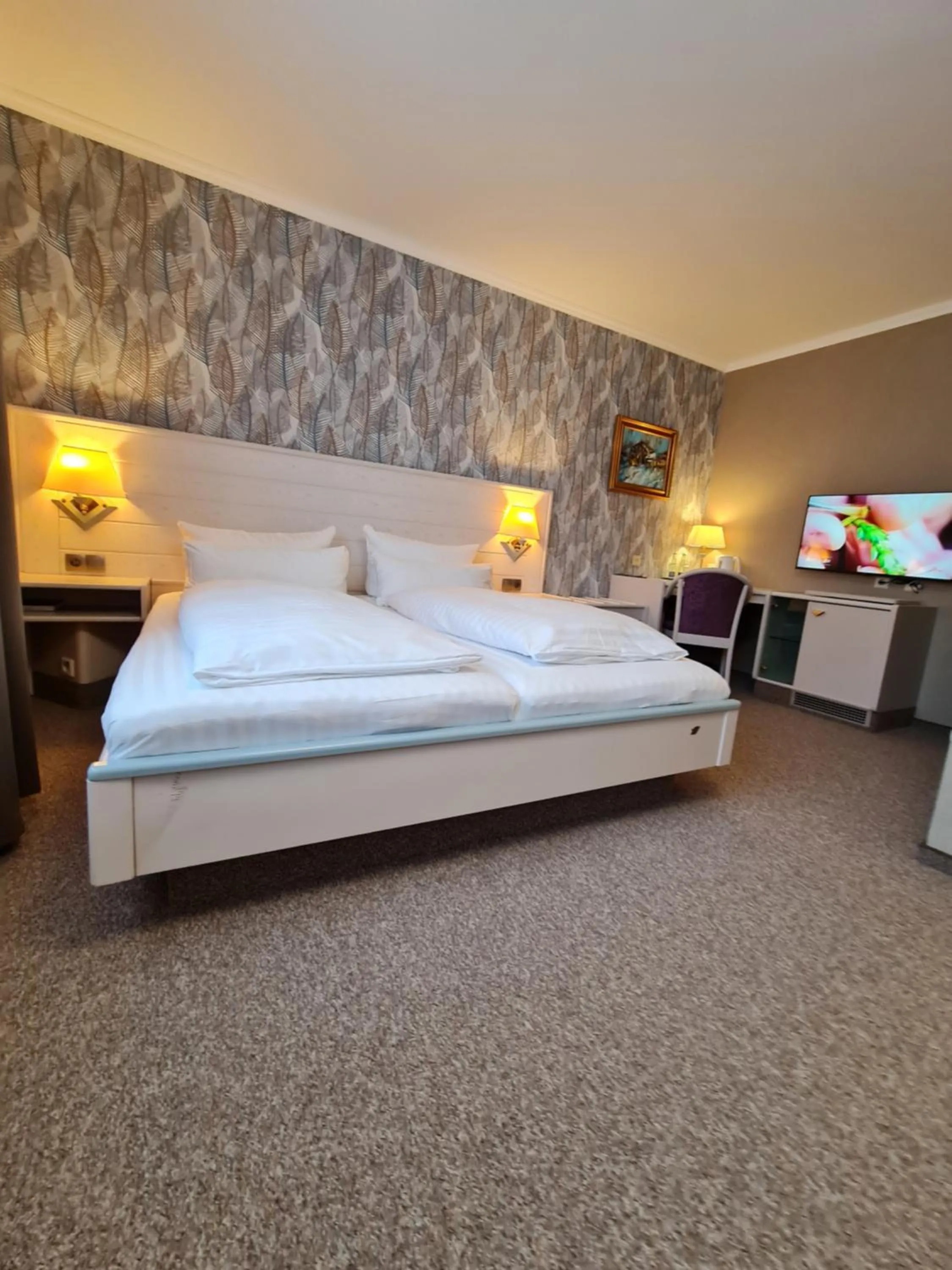 Bed in Ambiente Hotel garni