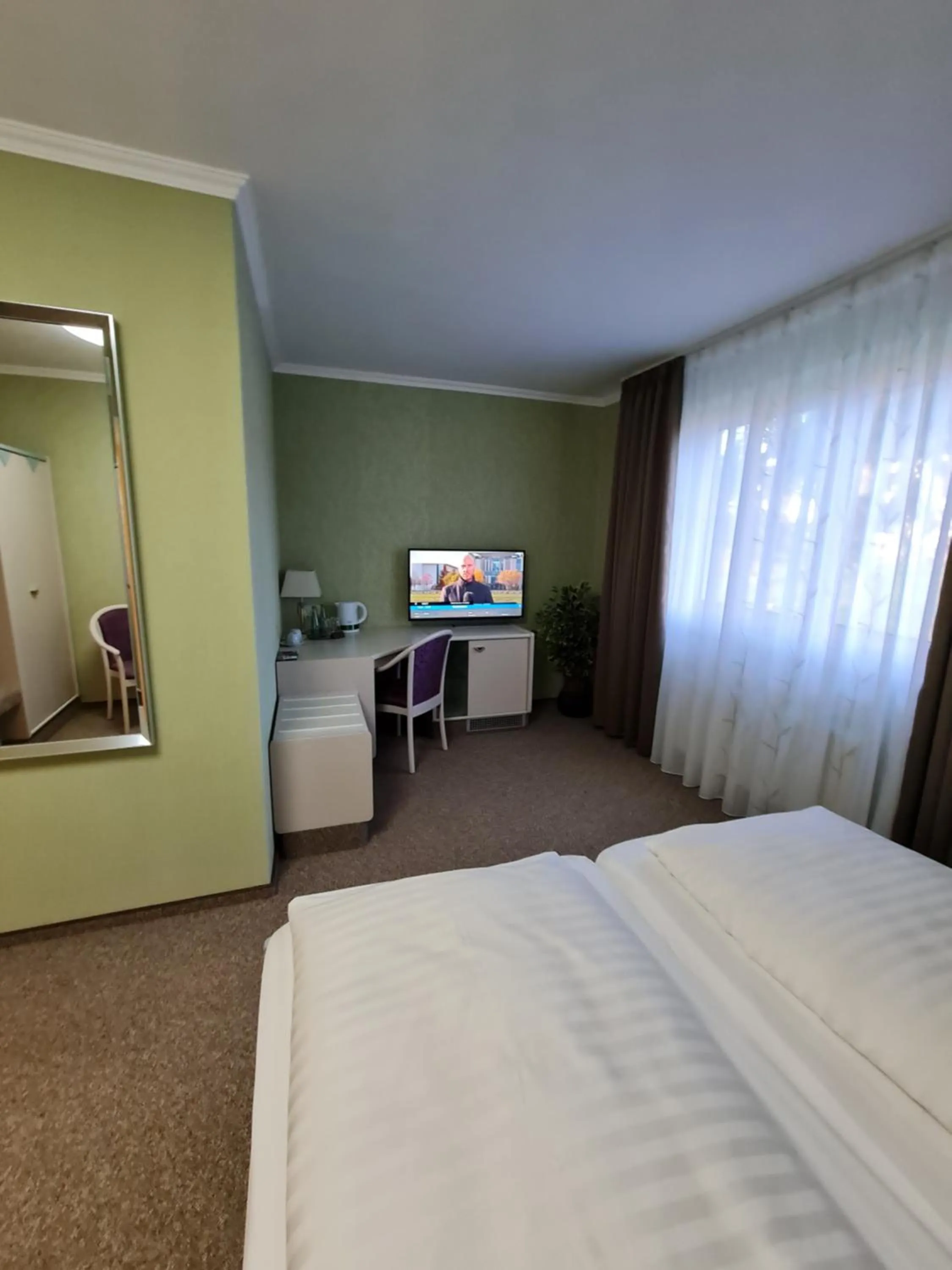 Bed in Ambiente Hotel garni