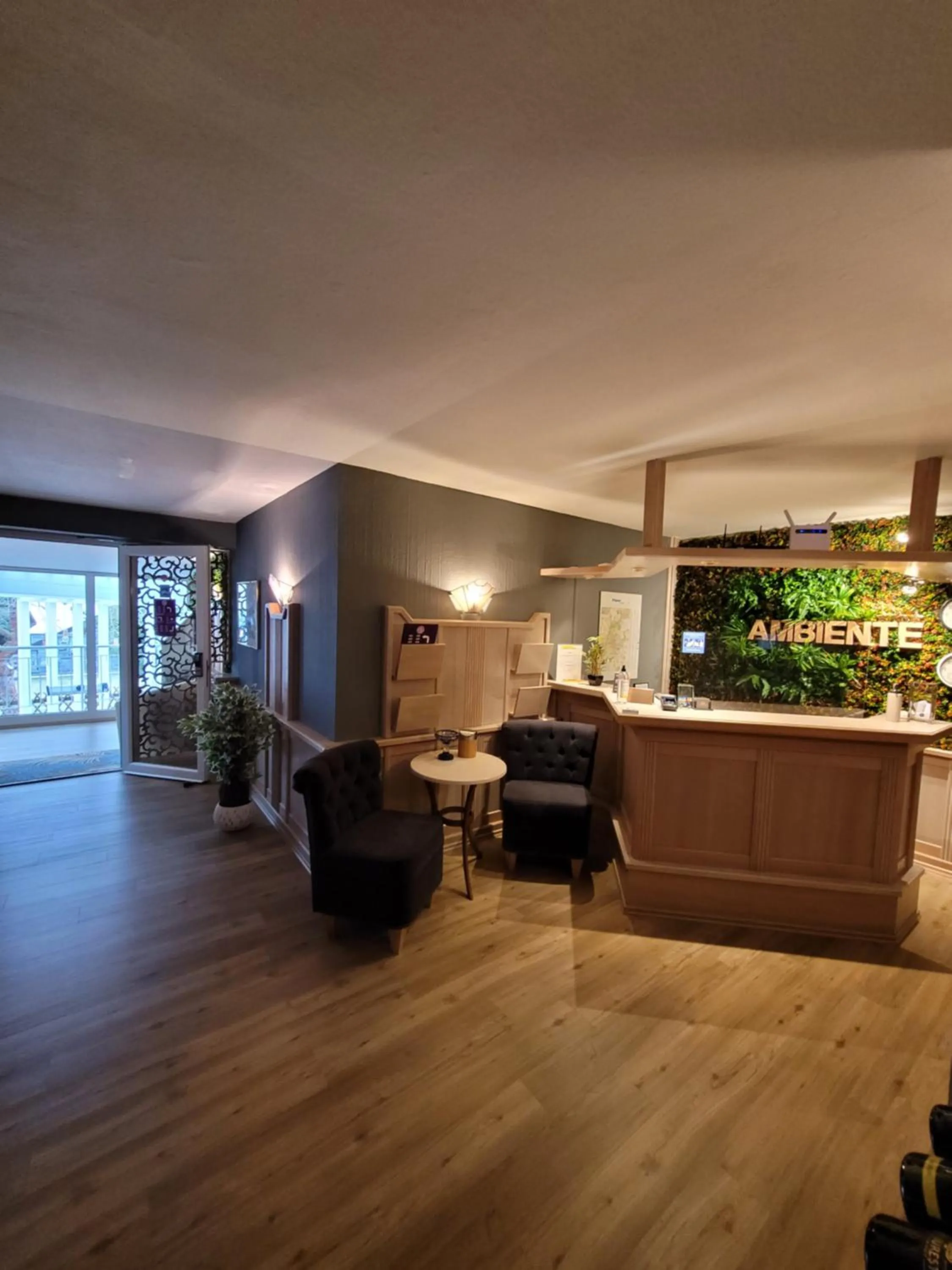 Lobby or reception in Ambiente Hotel garni