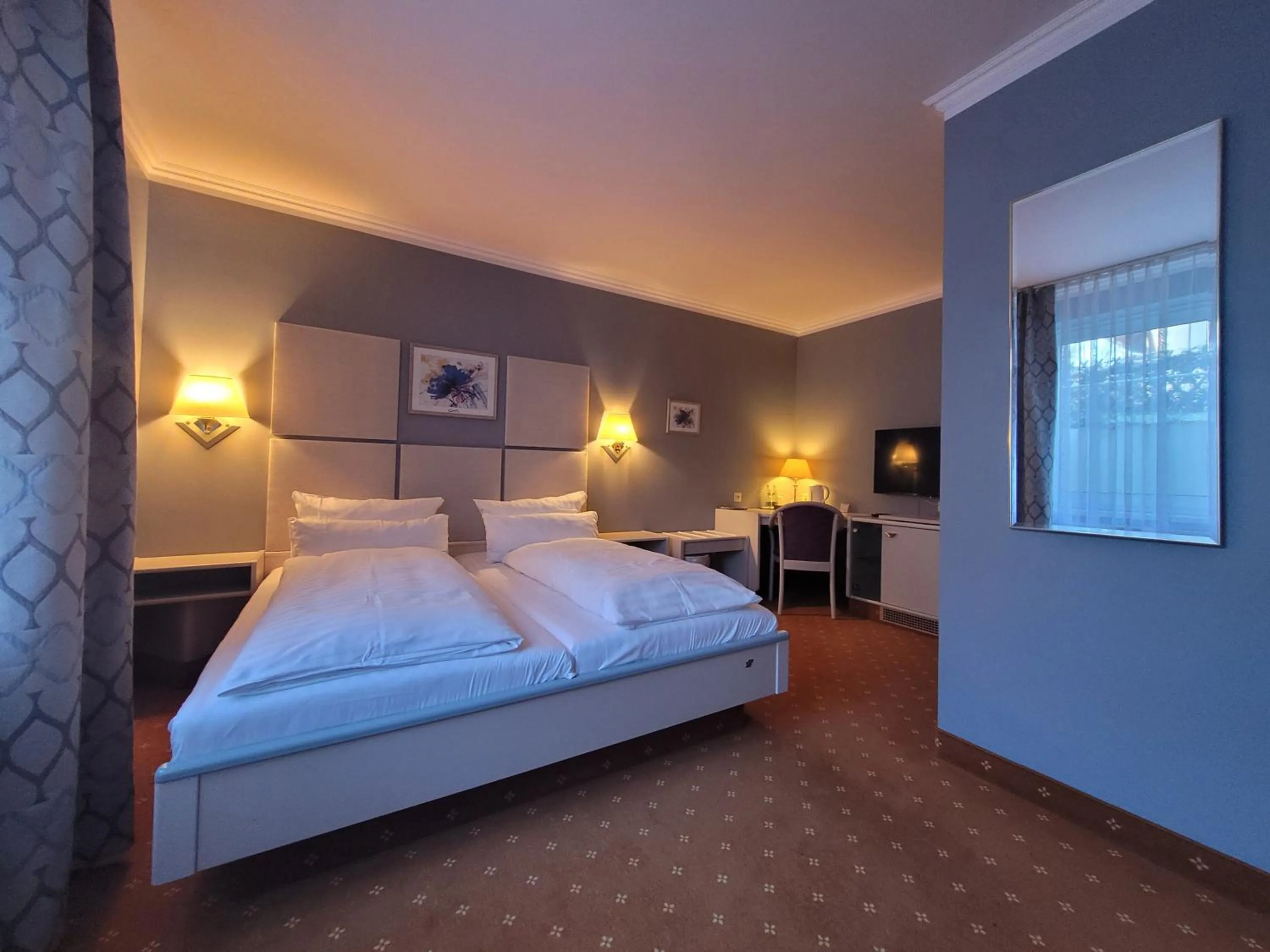 Bed in Ambiente Hotel garni