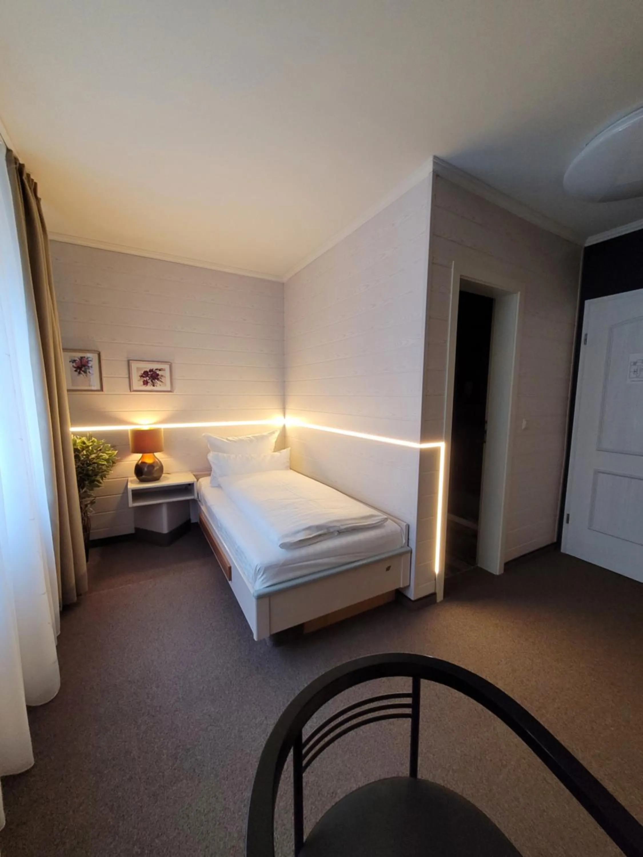 Bed in Ambiente Hotel garni