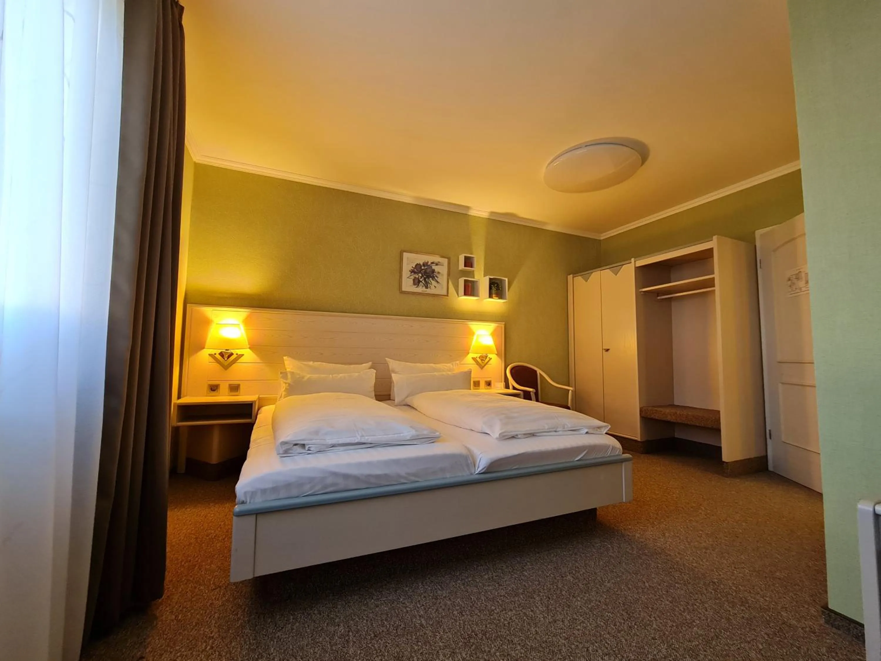 Photo of the whole room, Bed in Ambiente Hotel garni