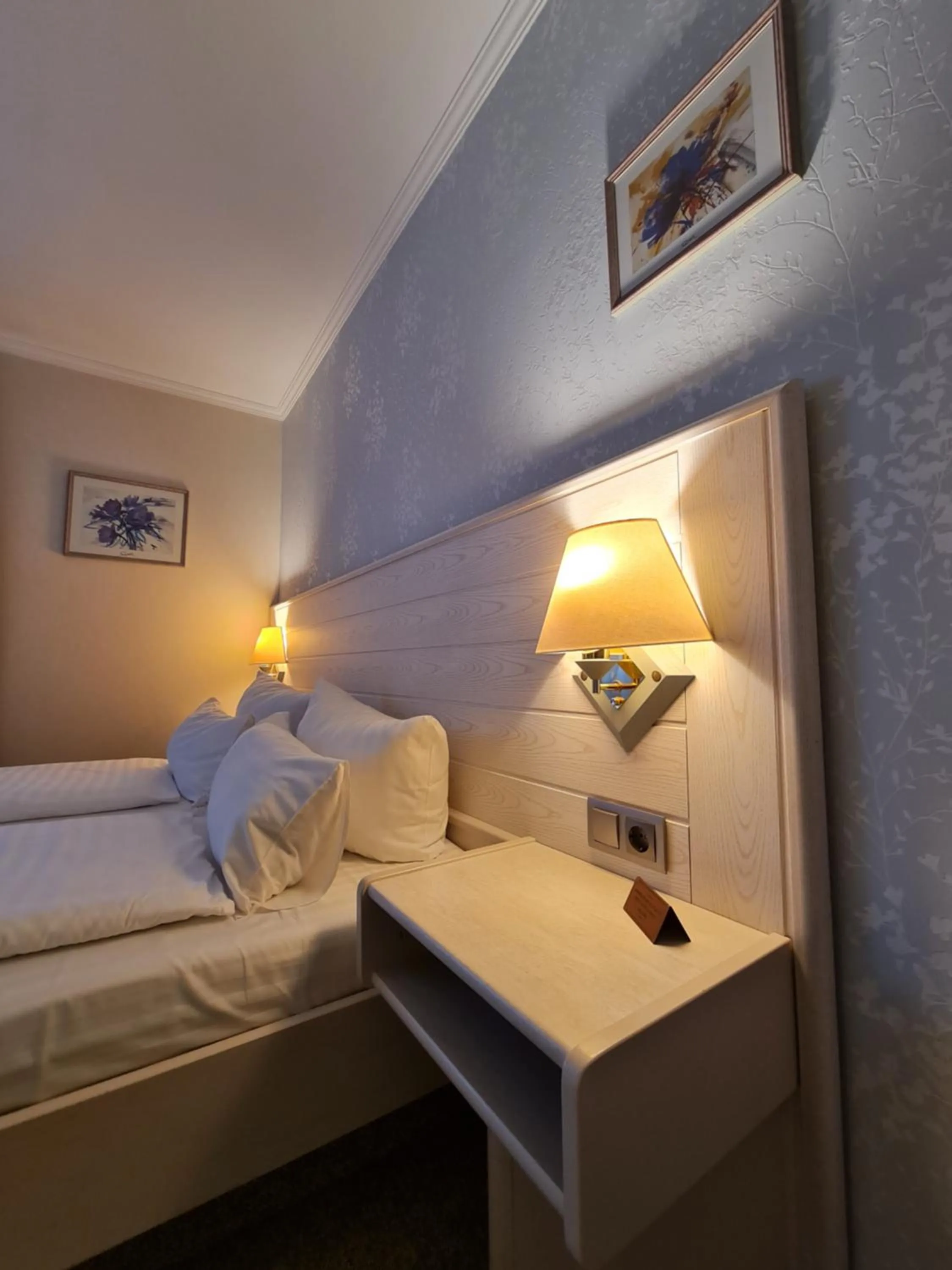 Bed in Ambiente Hotel garni