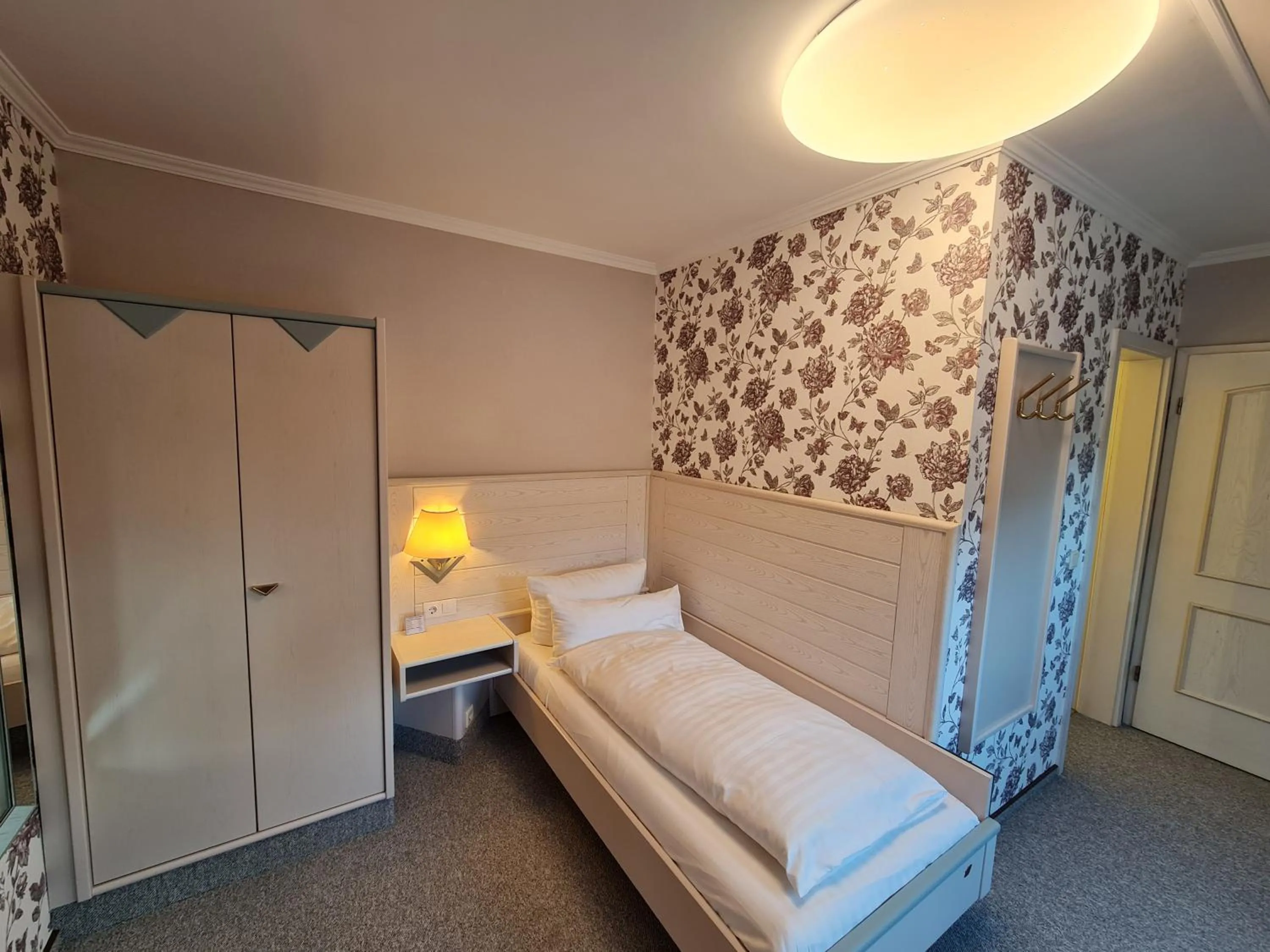 Bed in Ambiente Hotel garni