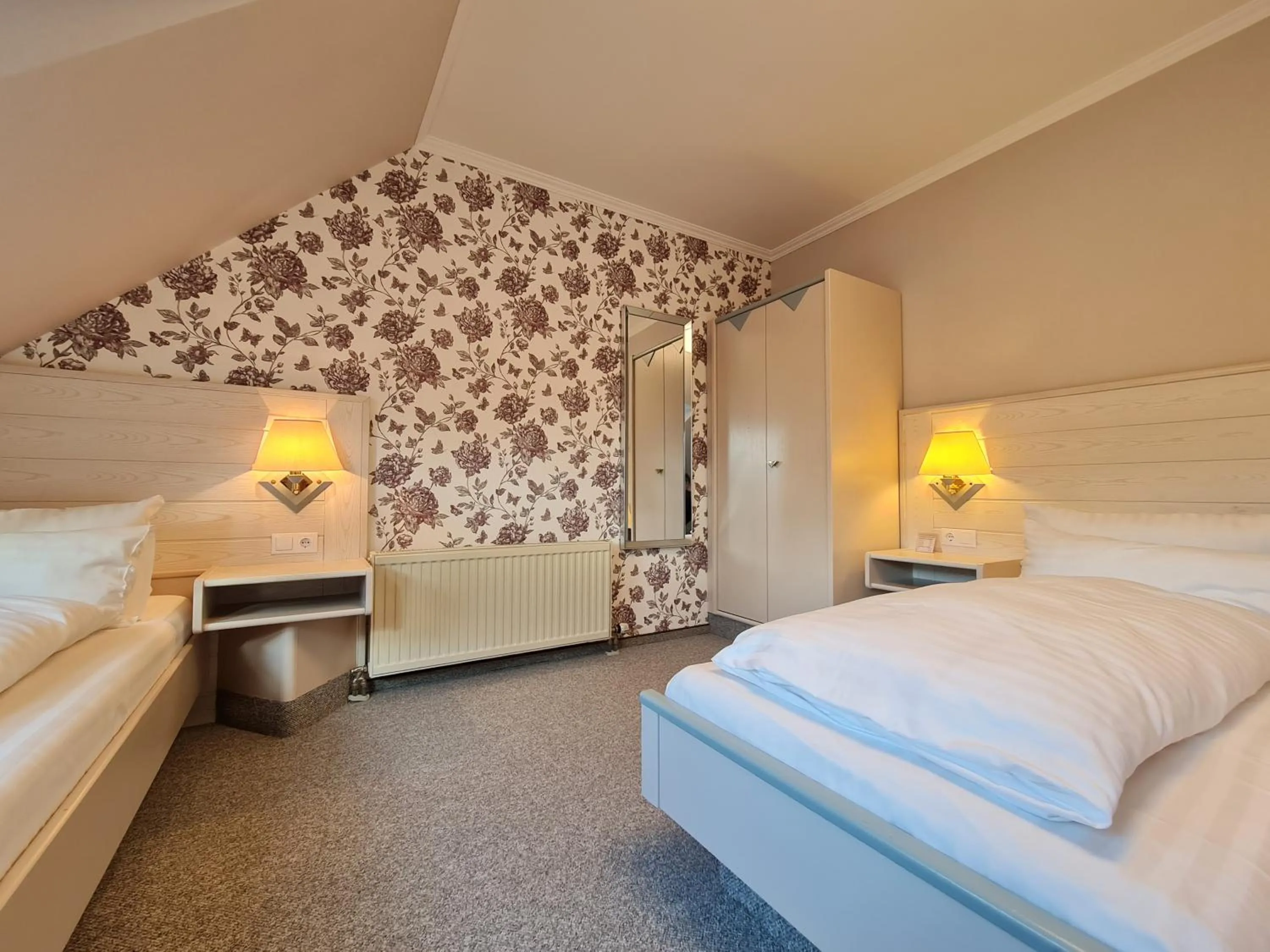 Bed in Ambiente Hotel garni