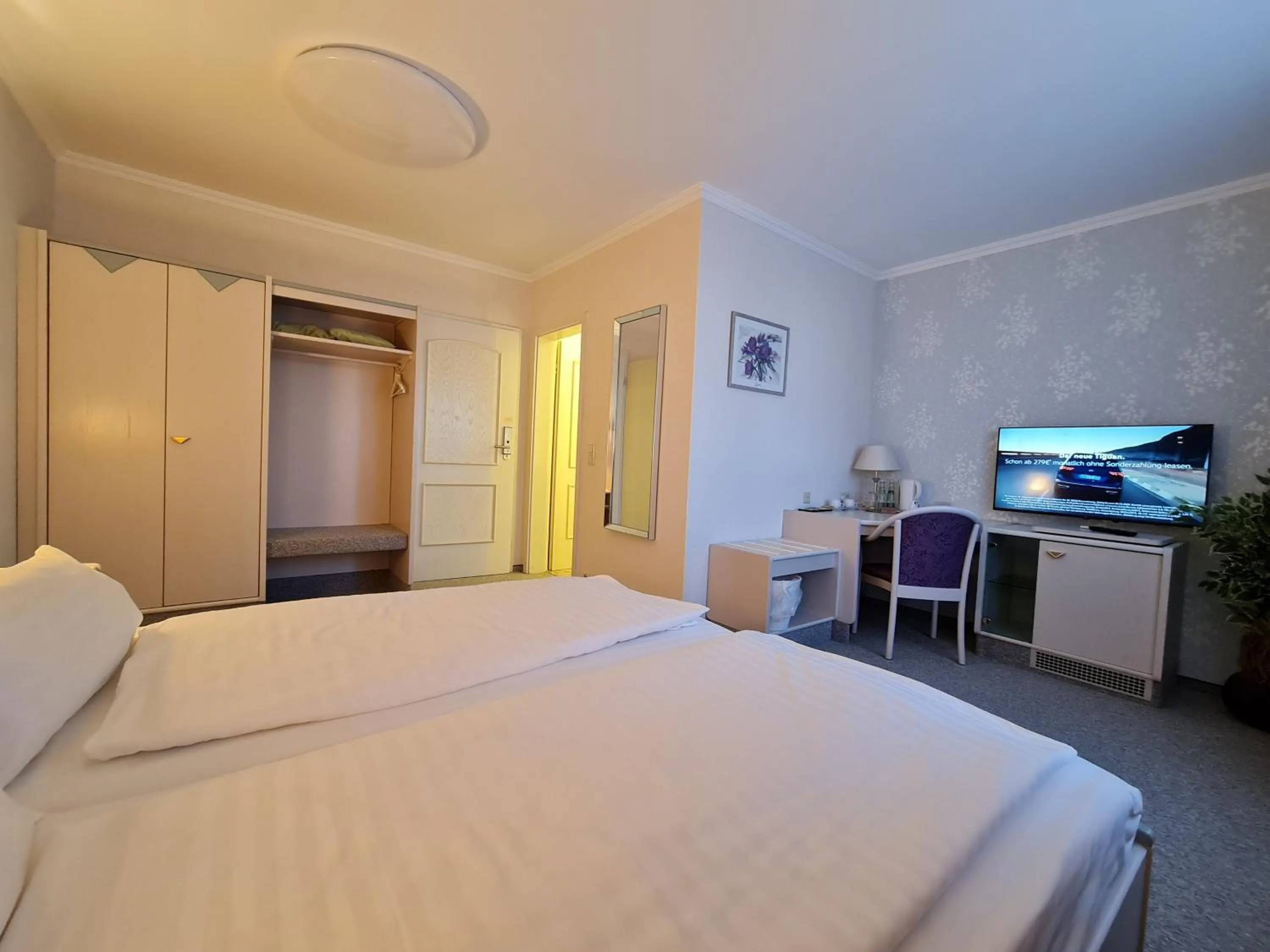 Bed in Ambiente Hotel garni