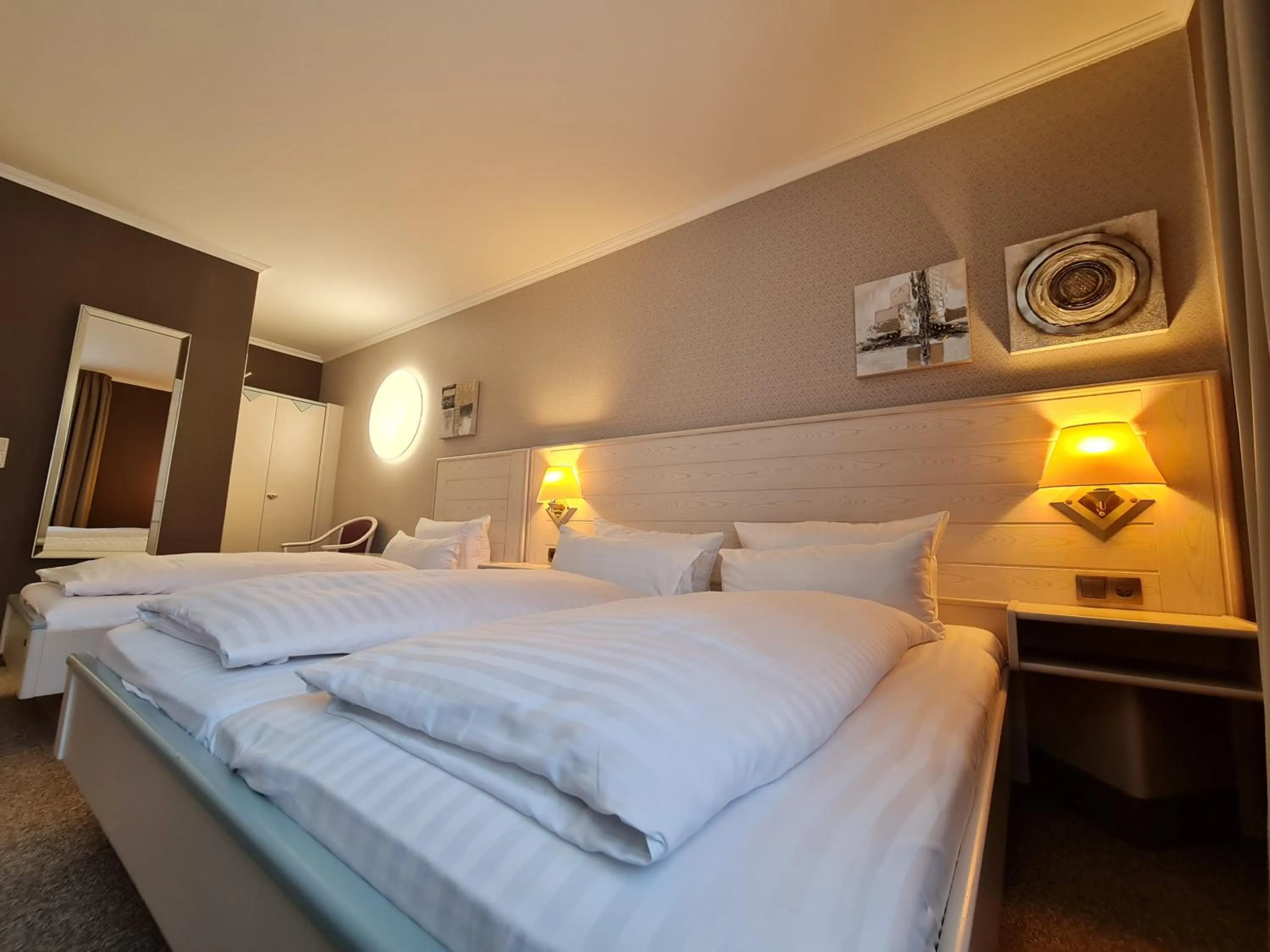Bed in Ambiente Hotel garni
