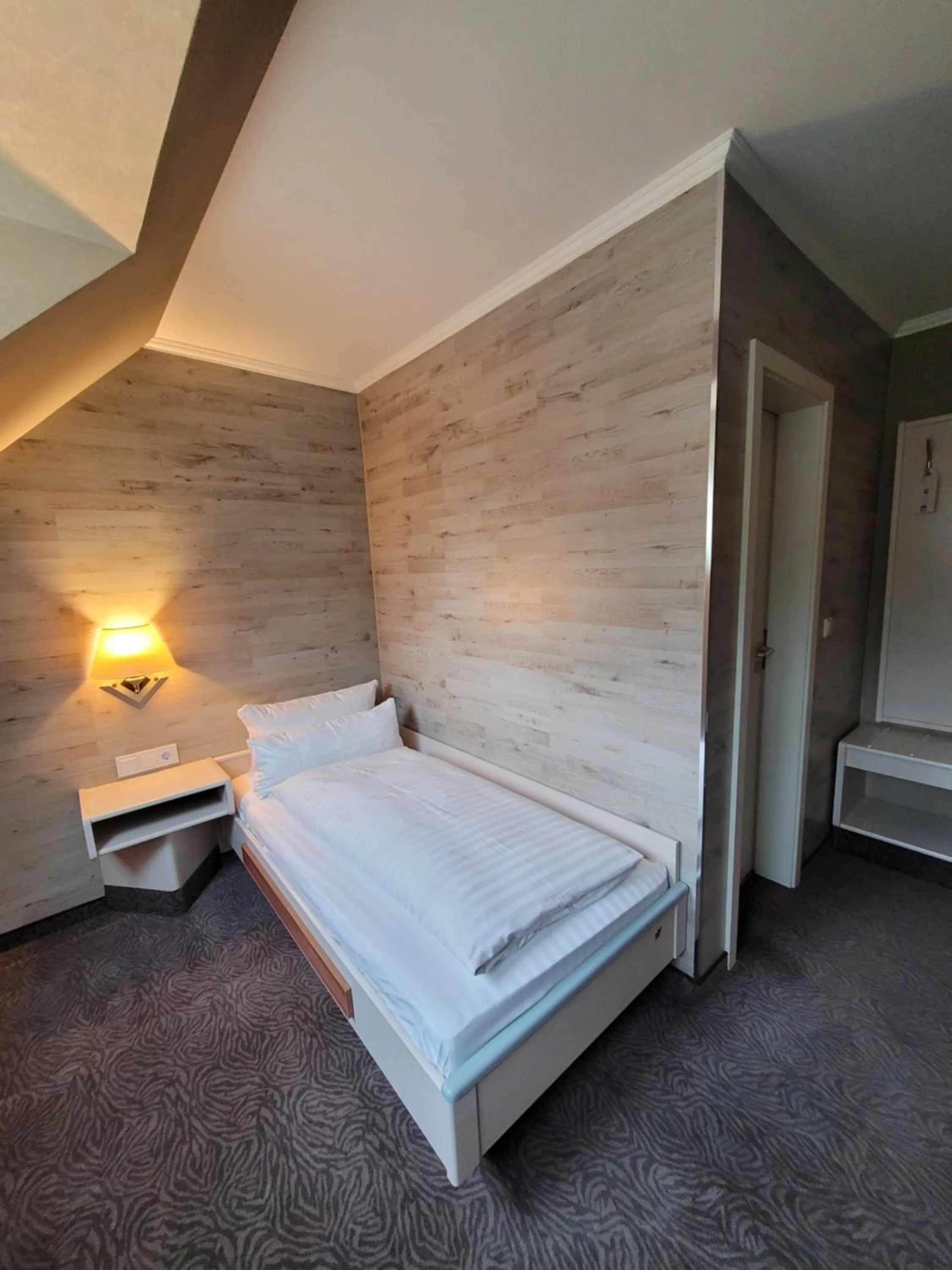 Bed in Ambiente Hotel garni