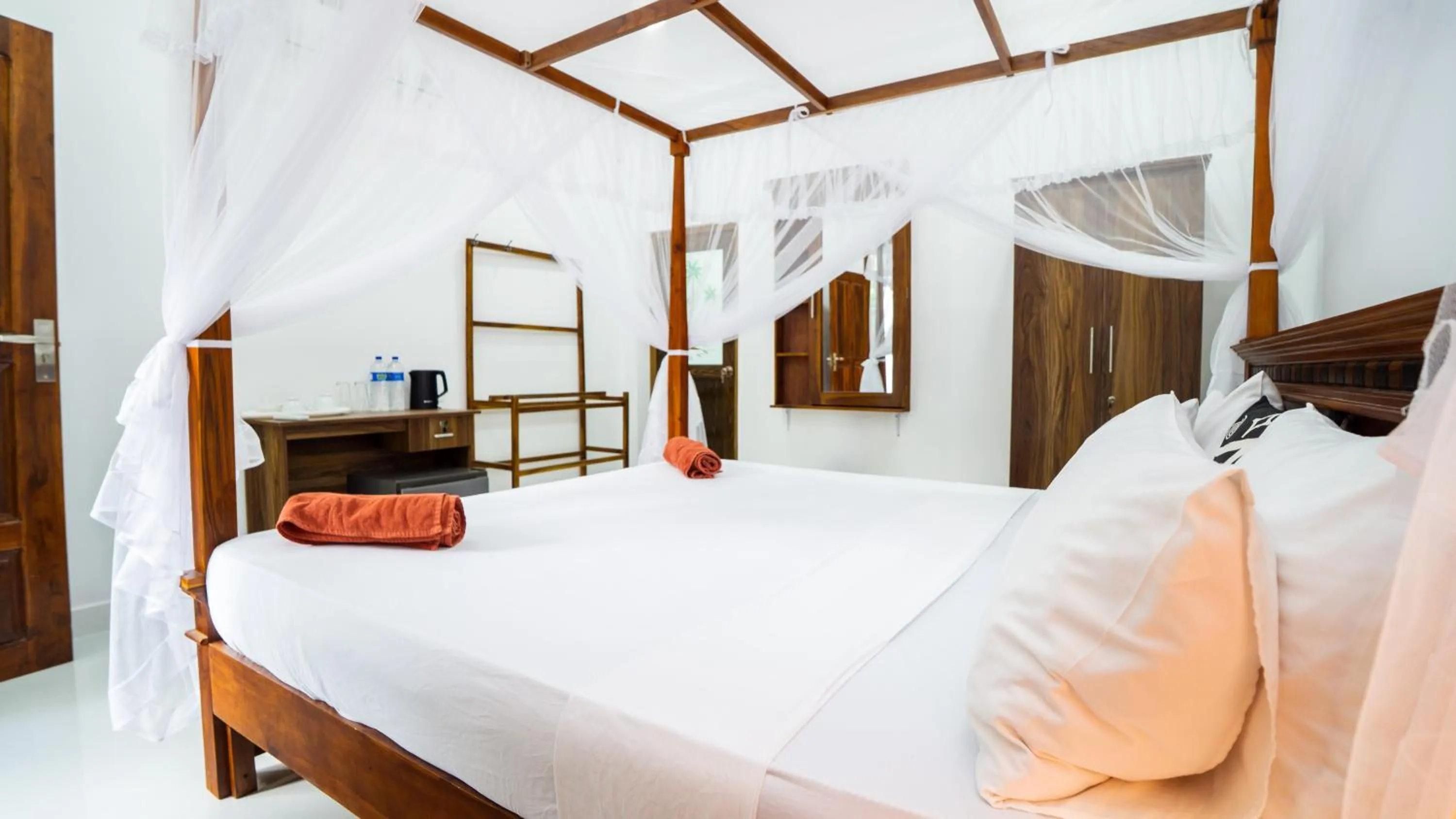 Bed in Sunrise Cottage