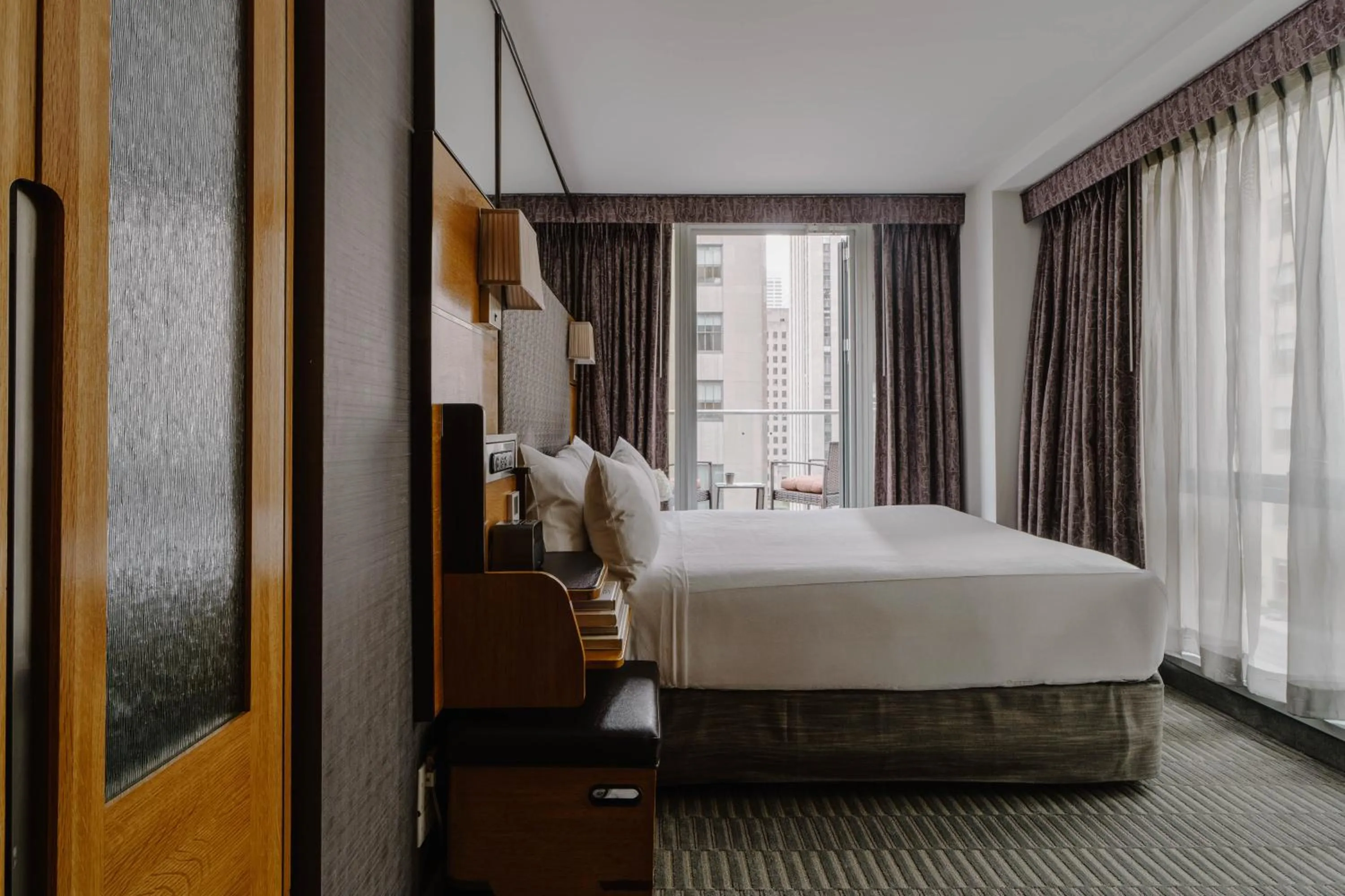 Bed in The Jewel Hotel, New York