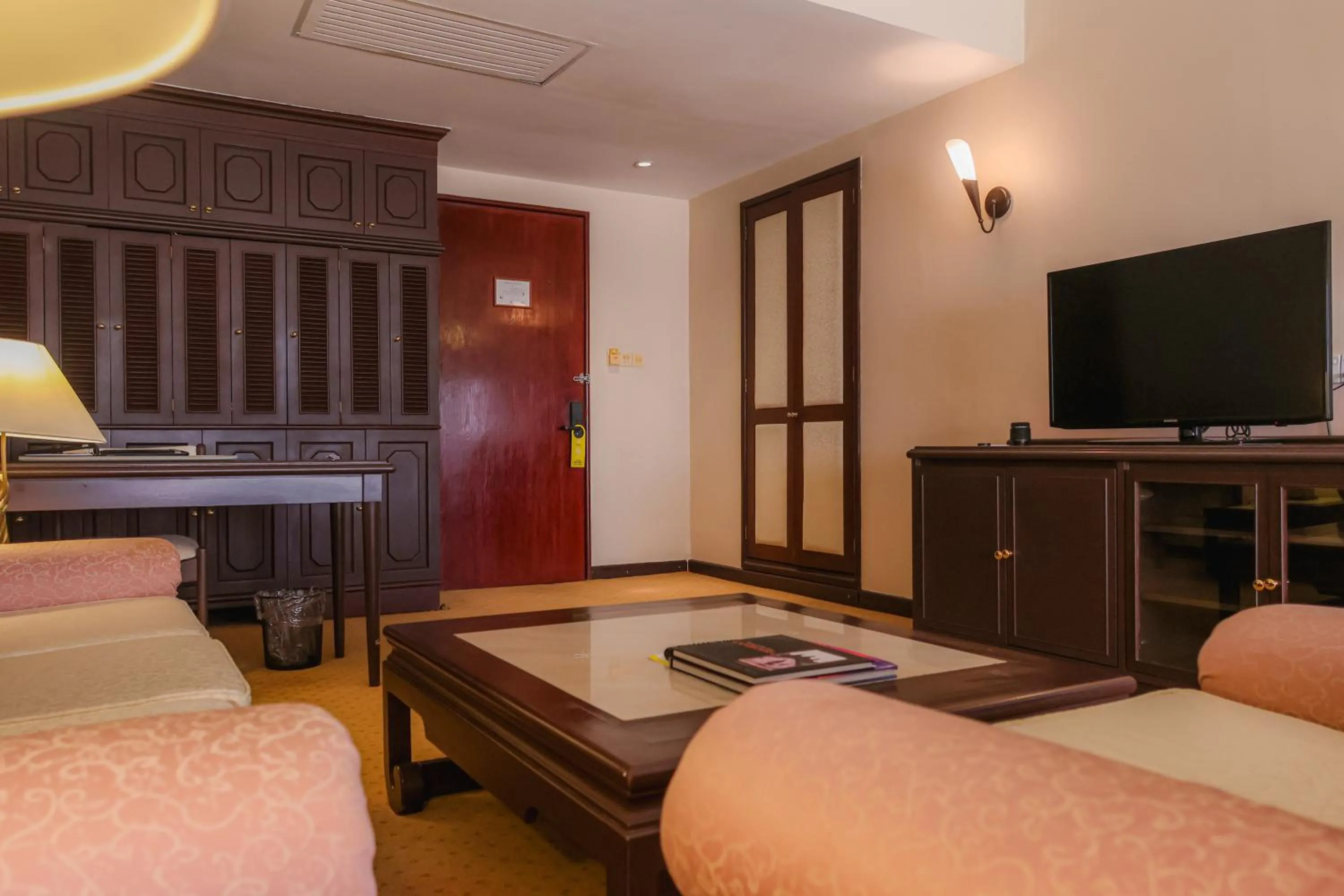 Seating area, Bed in Hotel Cambodiana