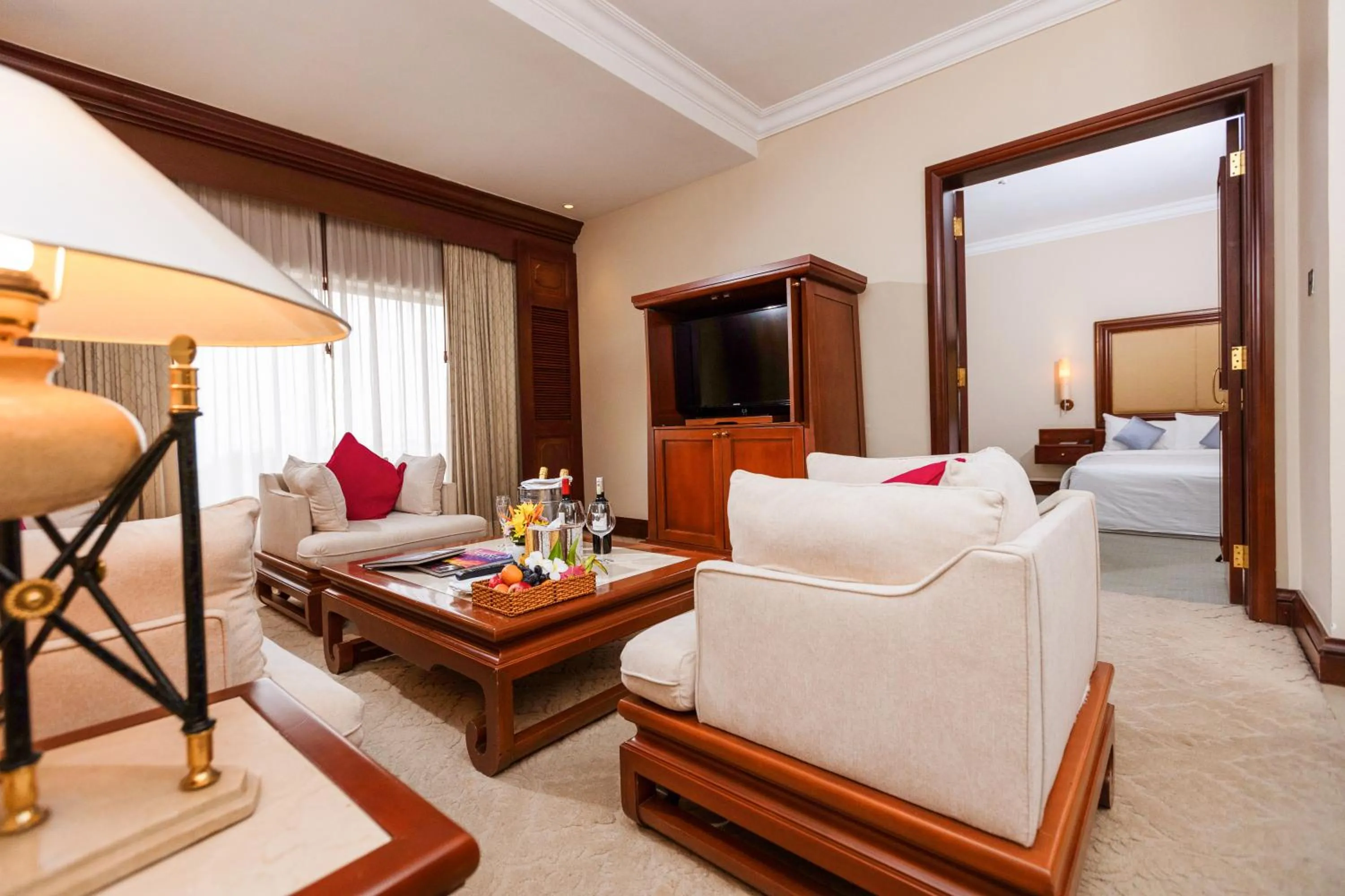 Living room, Bed in Hotel Cambodiana