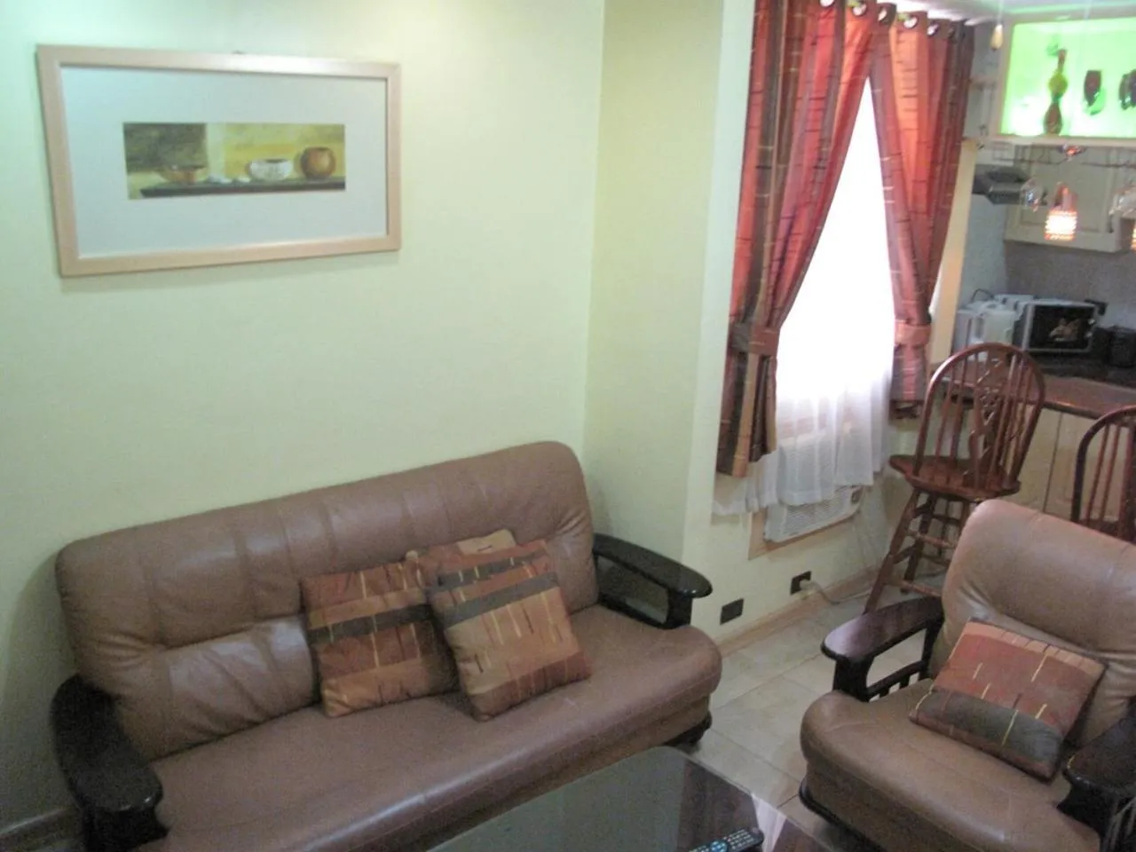 Kitchen or kitchenette in Makati Suites at Travelers Inn