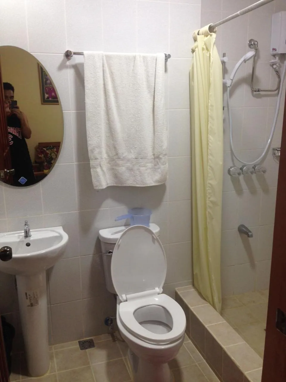 Toilet in Makati Suites at Travelers Inn