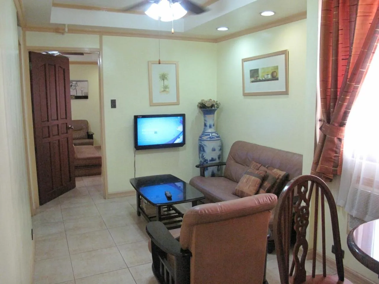 Living room in Makati Suites at Travelers Inn