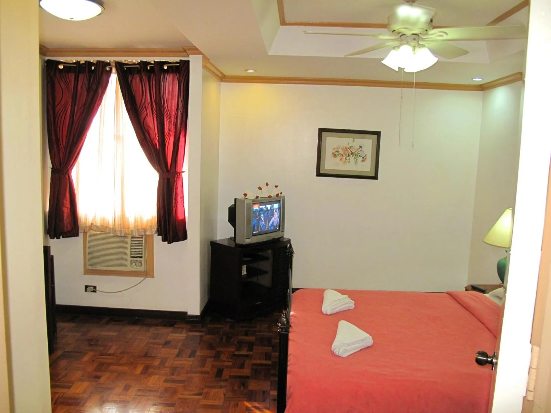 Bed in Makati Suites at Travelers Inn