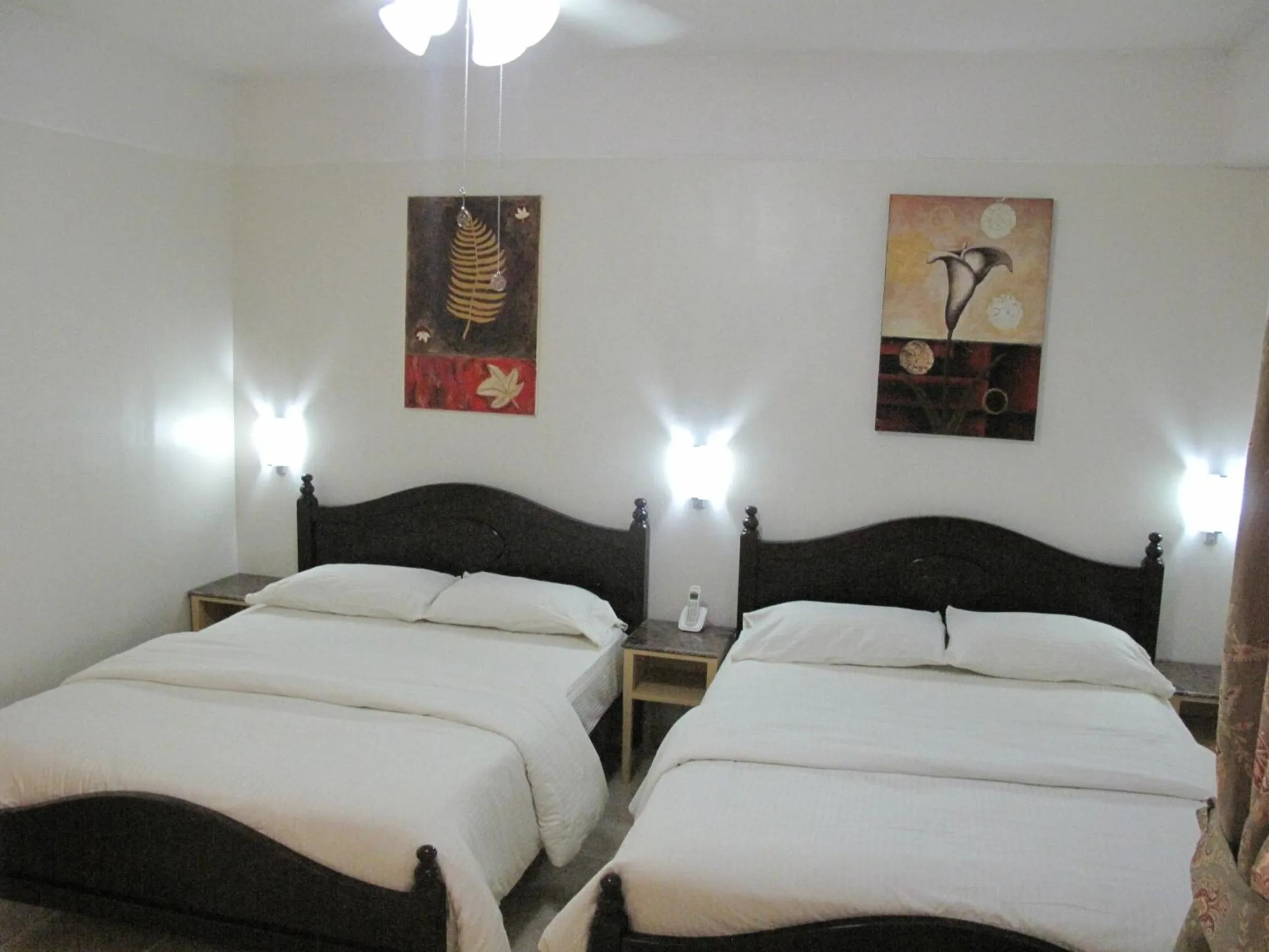 Bedroom, Bed in Makati Suites at Travelers Inn