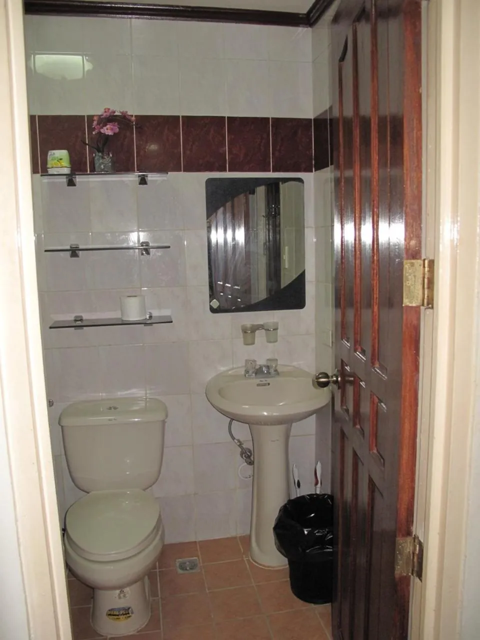 Toilet in Makati Suites at Travelers Inn