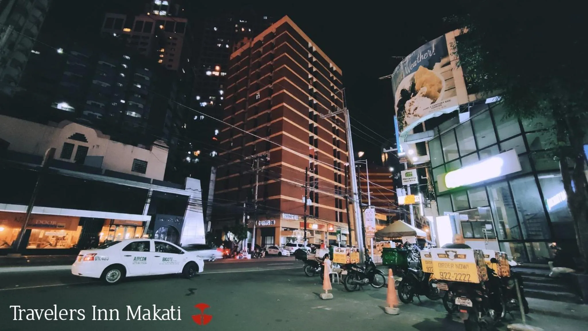 Property building in Makati Suites at Travelers Inn